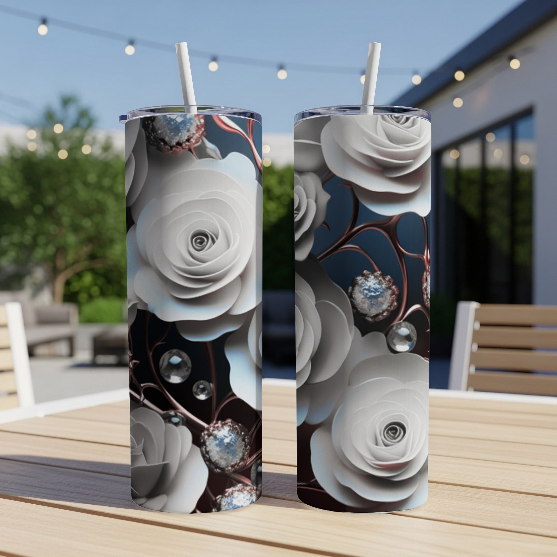 Two white rose tumblers with iridescent crystal accents on a table.