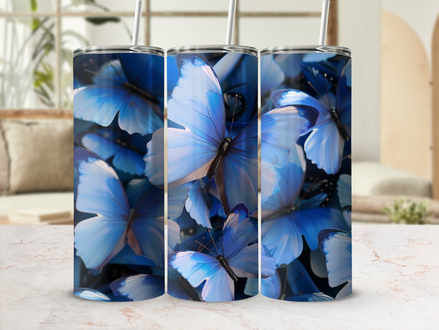 Blue butterflies cover a textured tumbler with two straws.
