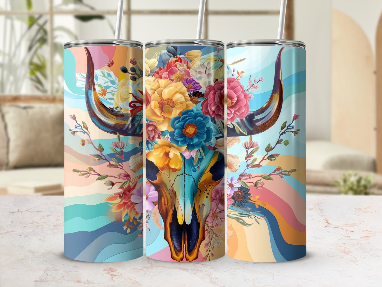 Three tumblers with floral bull skull design and wavy colorful backgrounds.