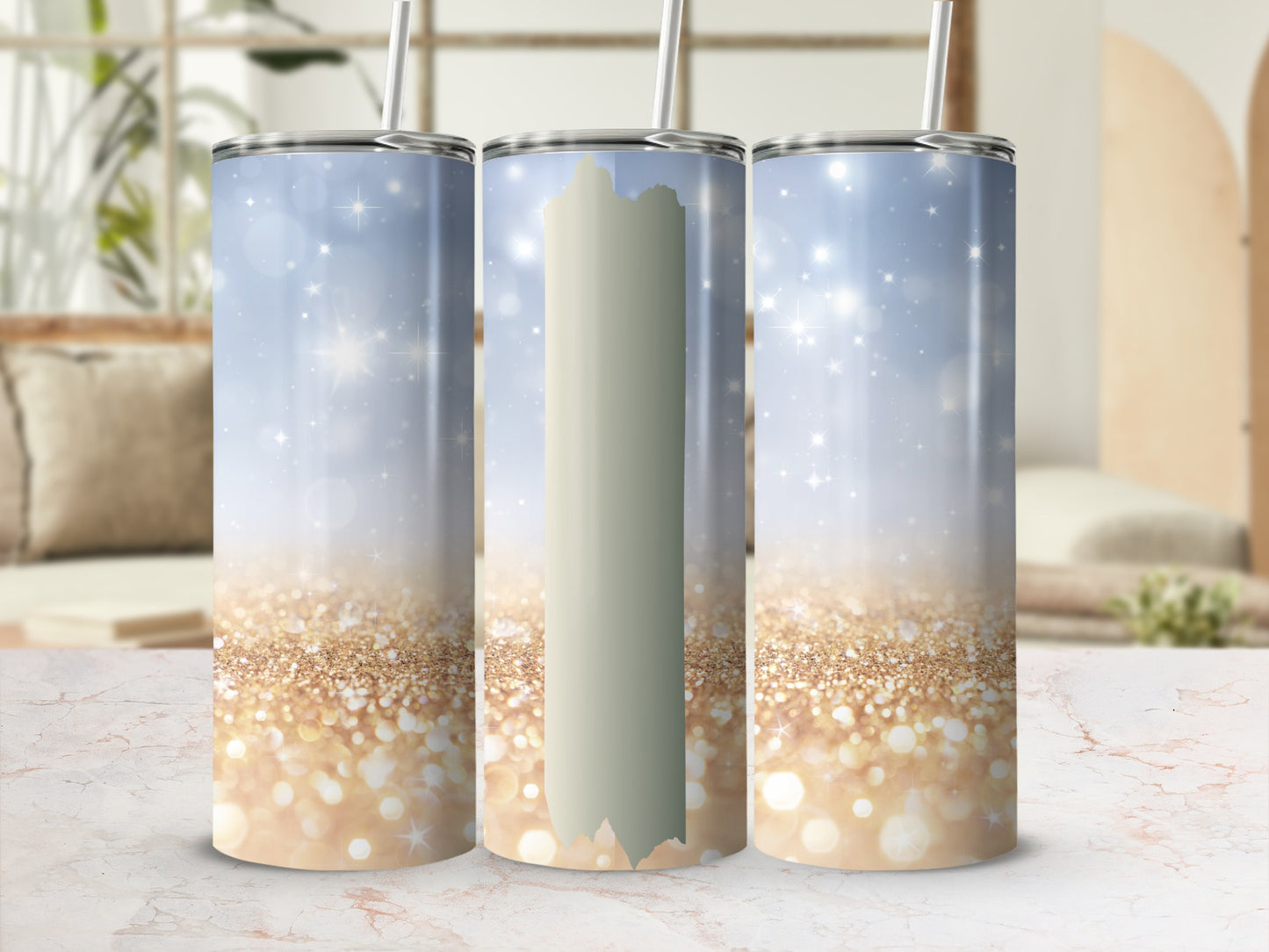 Three glitter-covered tumblers with a bokeh background.