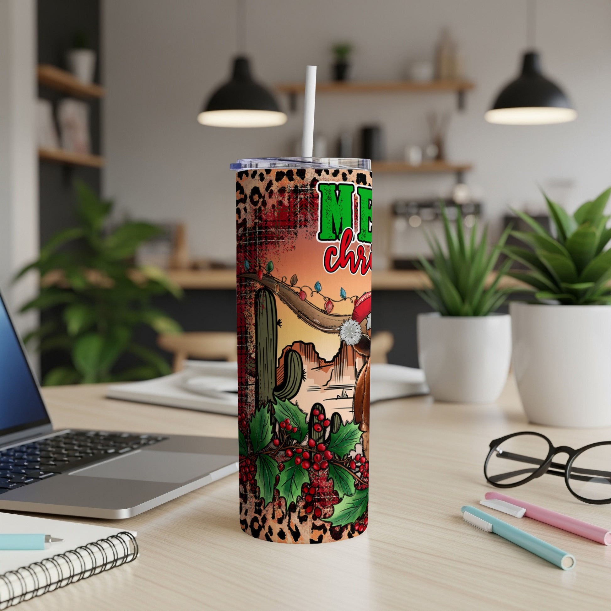 Tumbler with leopard print, cactus, and "Merry Christmas" text.
