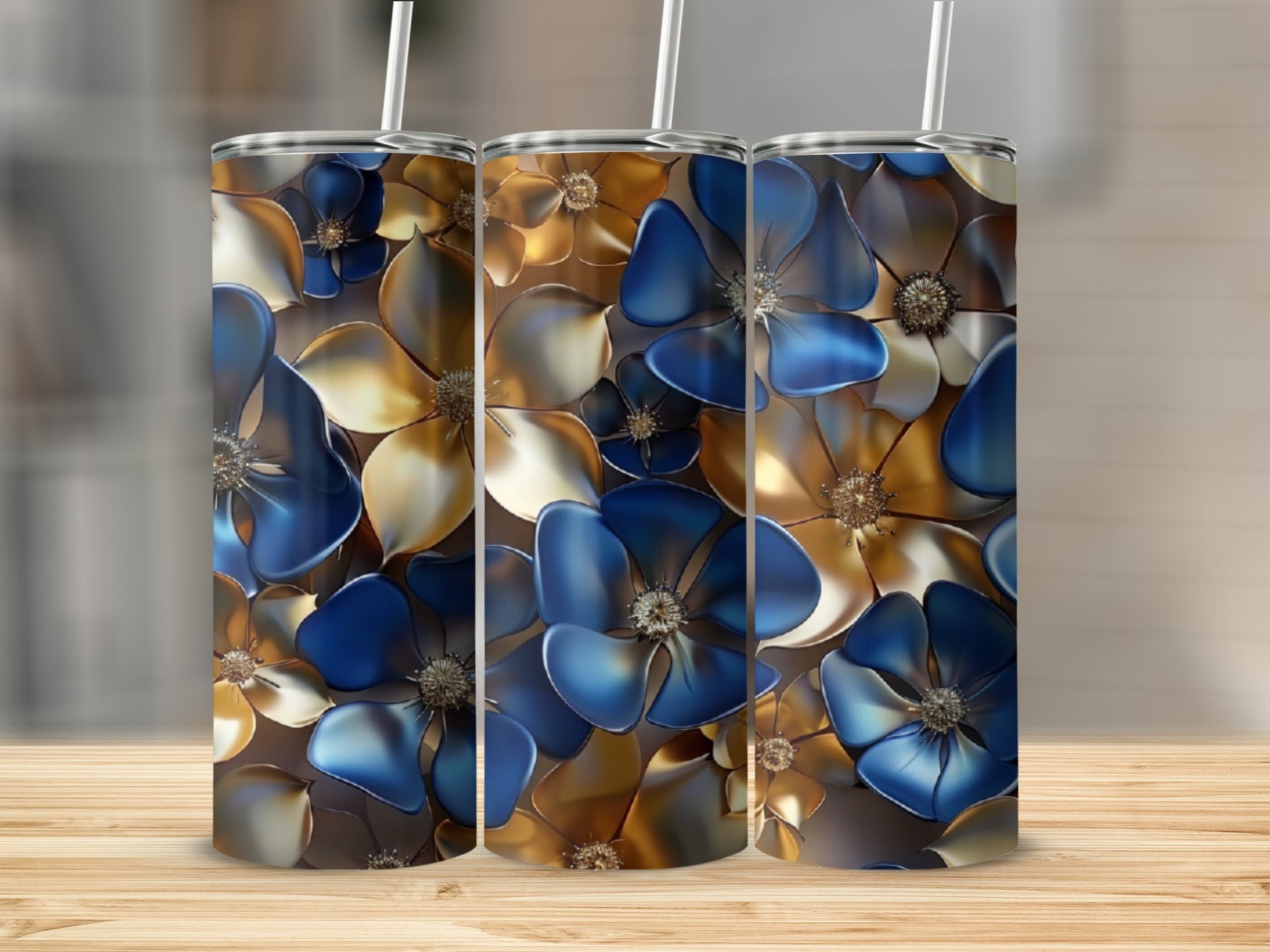 Three tumblers with a metallic blue and gold floral pattern.