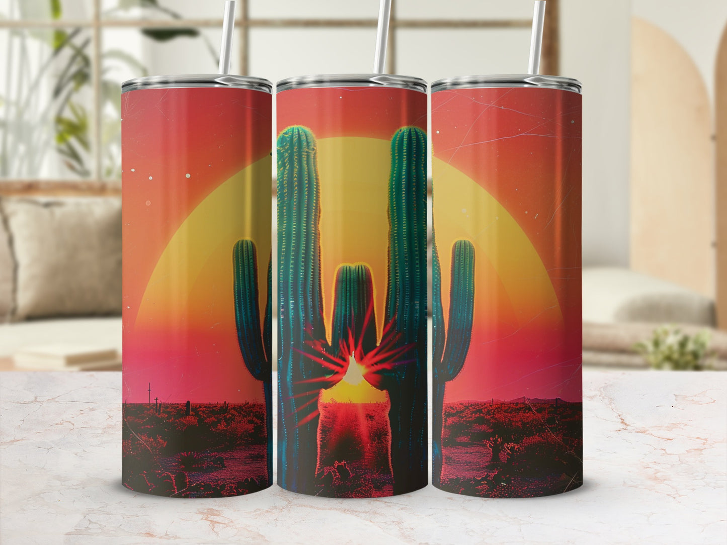 Three tumblers with sunset desert cactus graphic.