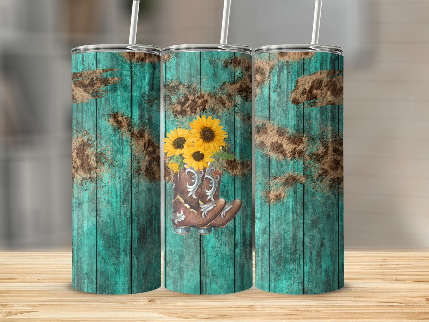 Rustic cowboy boot with sunflowers on teal wood background.