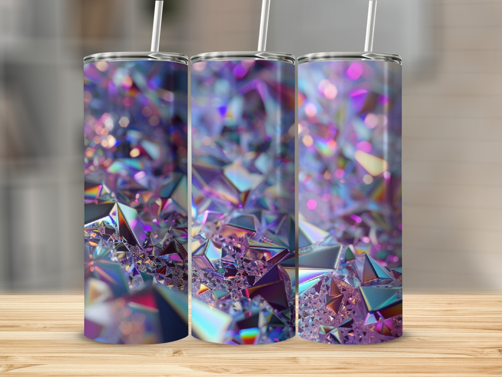 Three tumblers with iridescent, geometric, faceted crystal patterns.