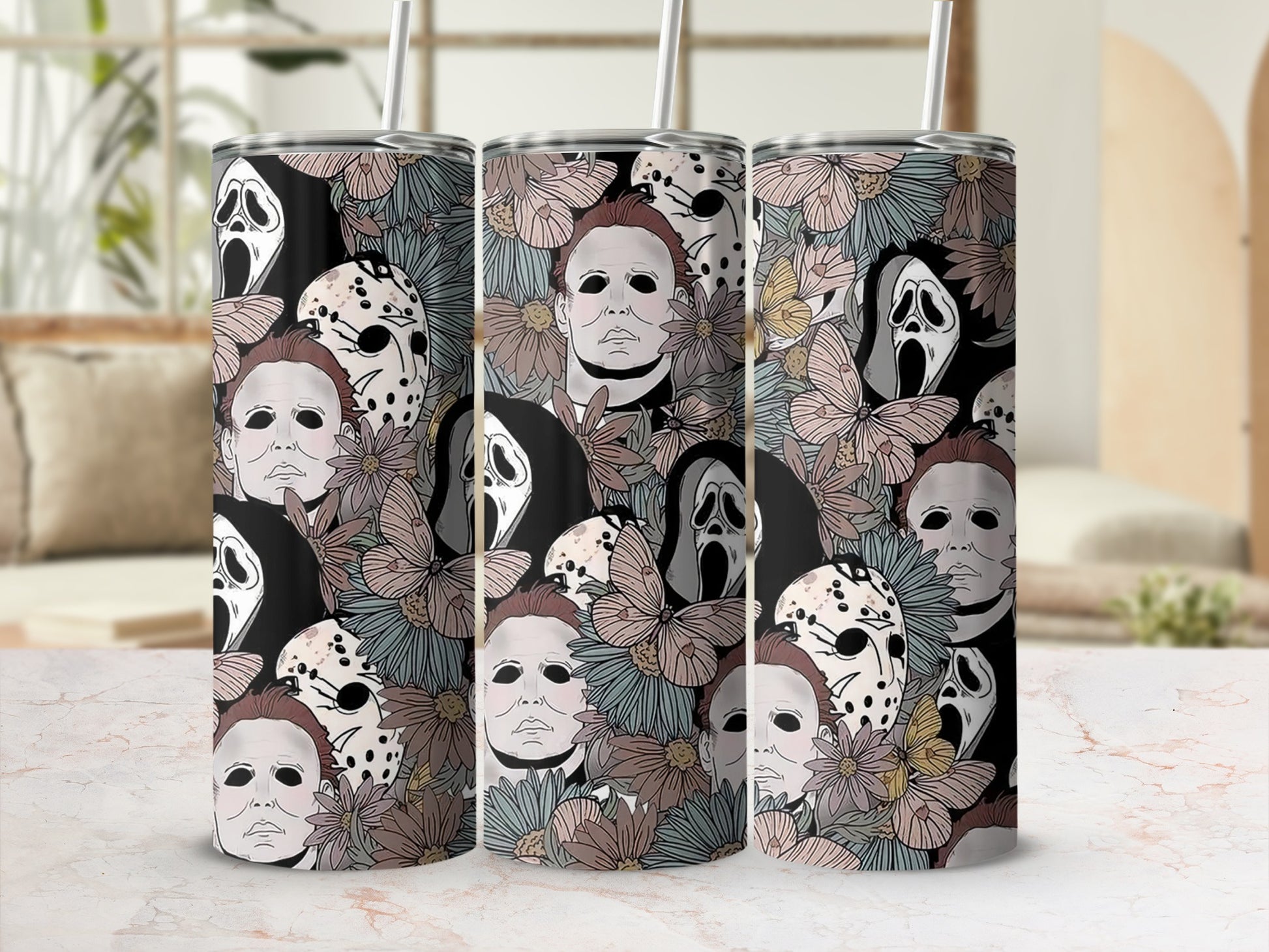 Horror movie masks and flowers pattern on tumblers.