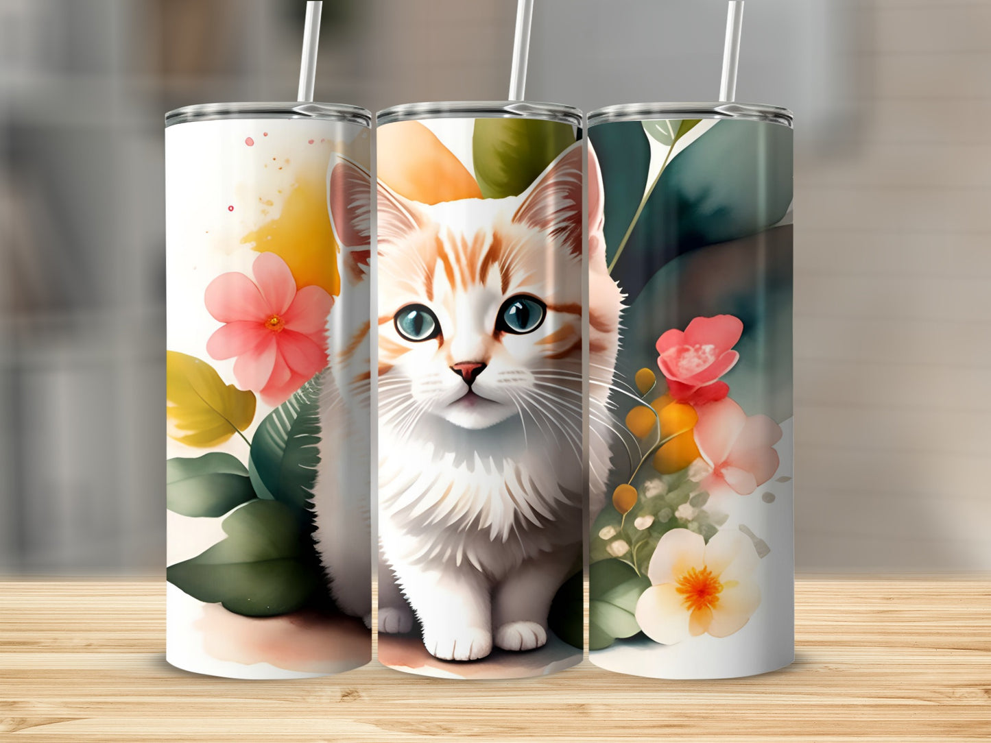 White and orange cat with blue eyes on a floral tumbler.