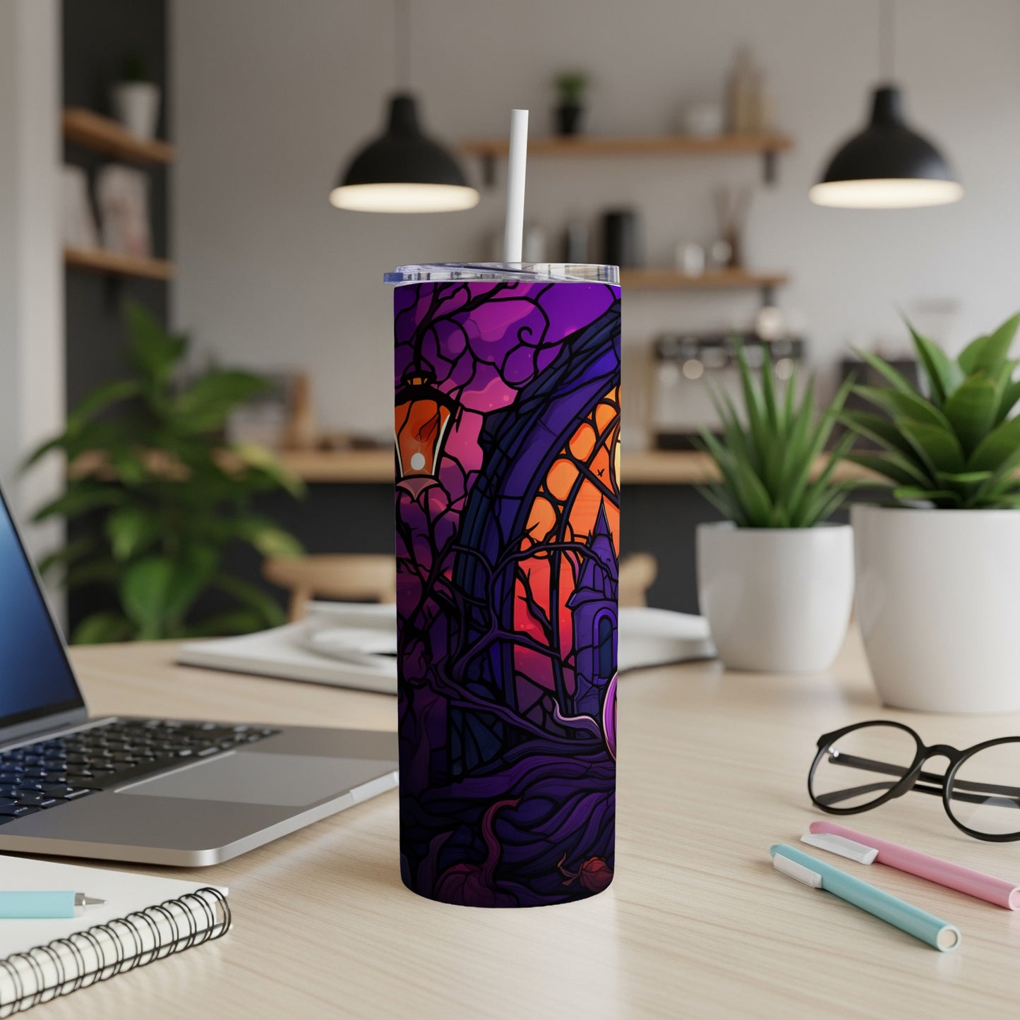 Purple Halloween tumbler with spooky house and moon design.