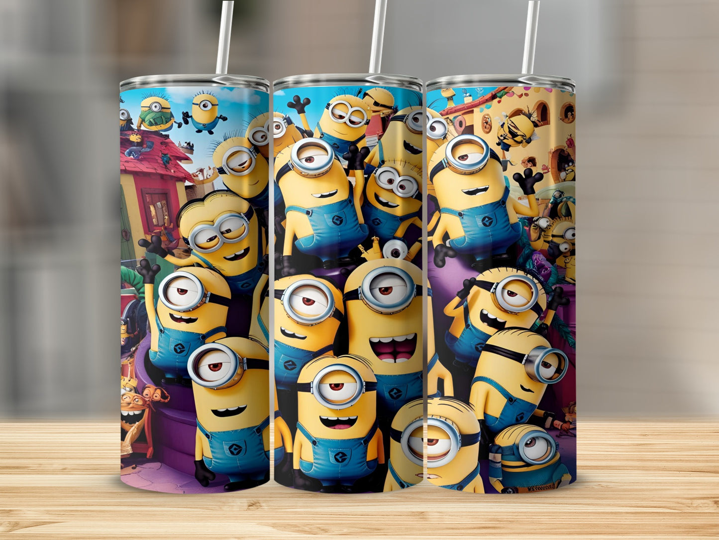 Three Minions character tumblers with lids and straws, featuring a village background.