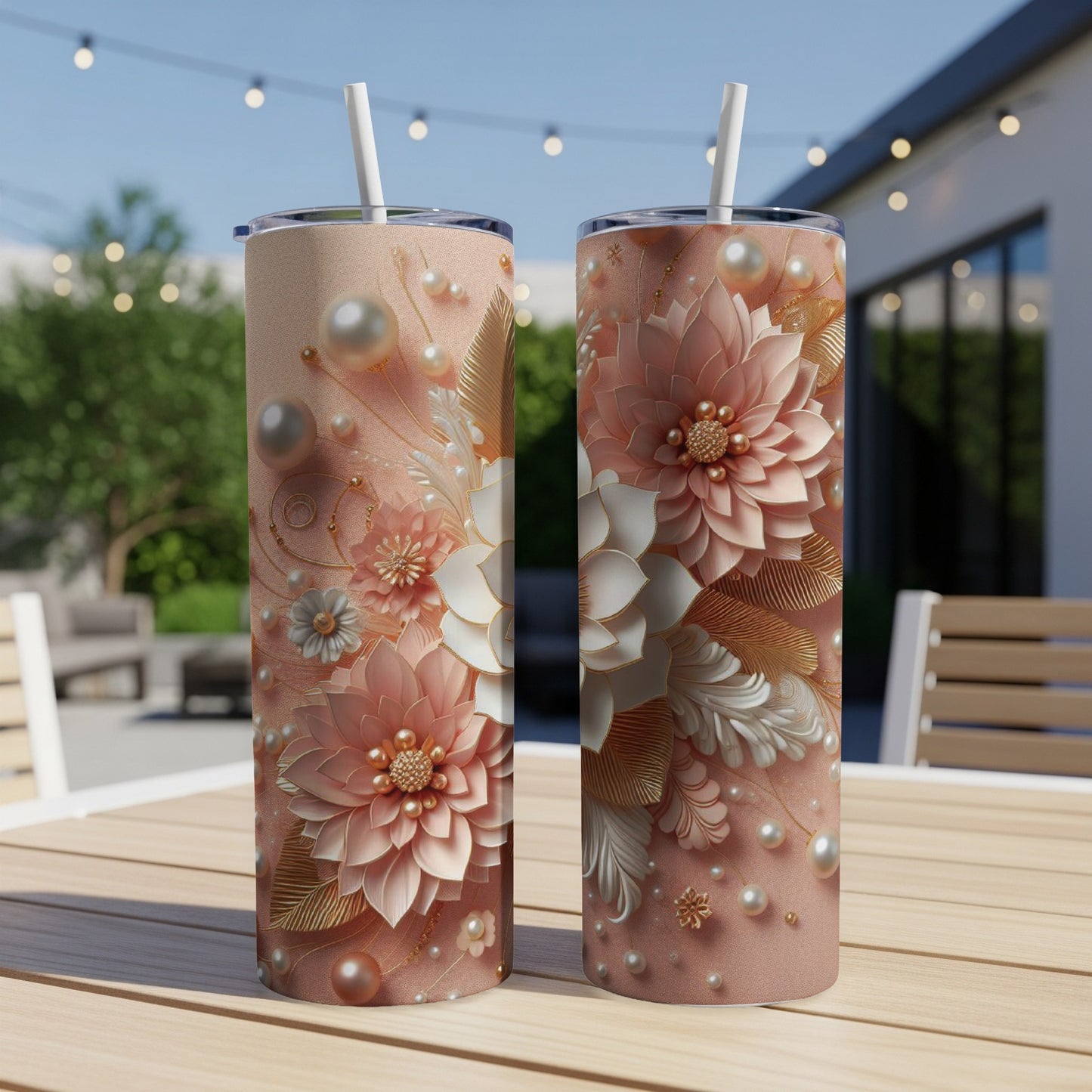 Two tall, skinny tumblers with pink floral and pearl designs.