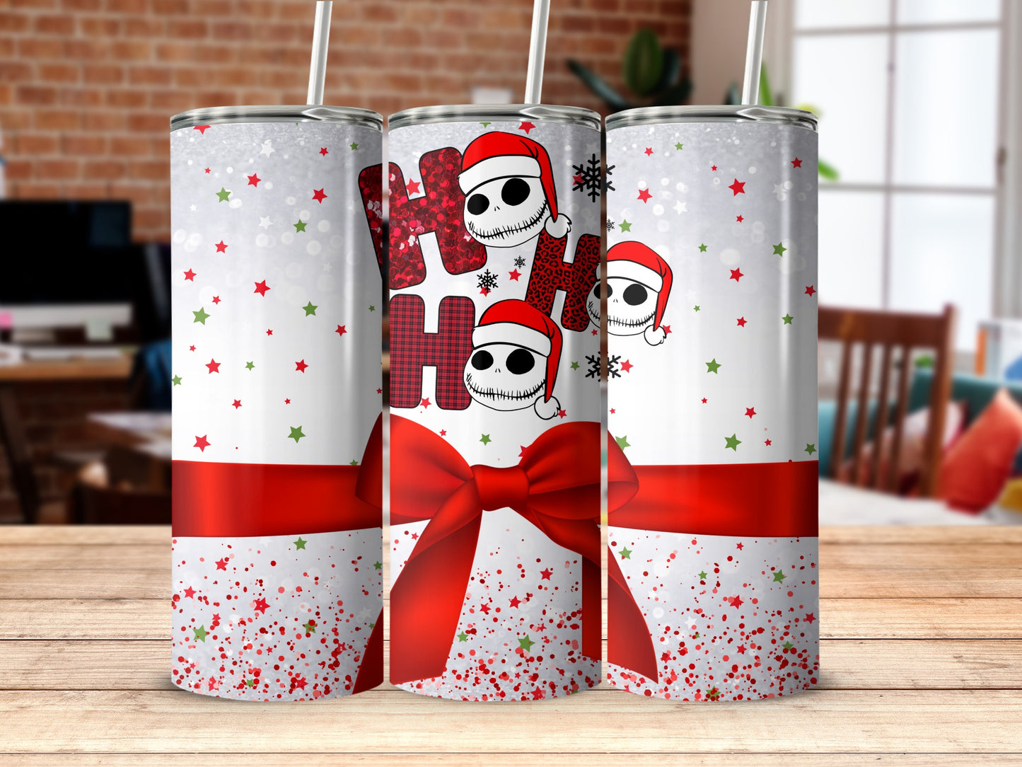 Christmas tumbler with "Ho Ho Ho" and Jack Skellington heads.
