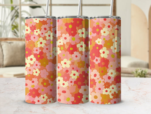 Three tumblers with a repeating floral pattern of pink, red, and yellow flowers.