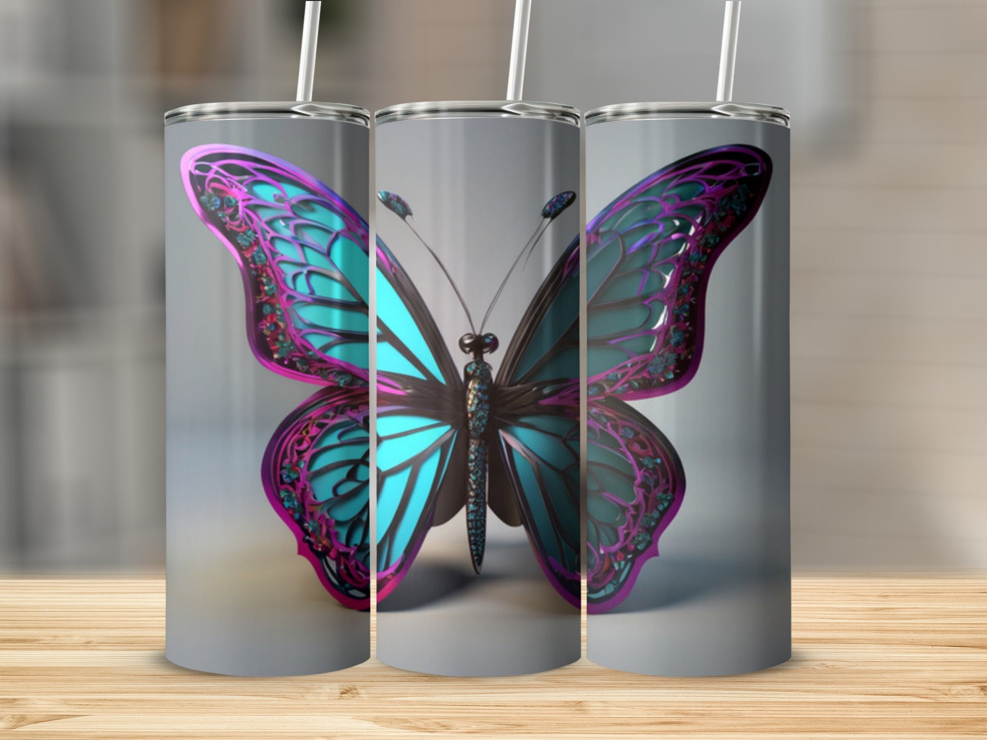 Butterfly tumbler with straw, featuring teal and pink wings.