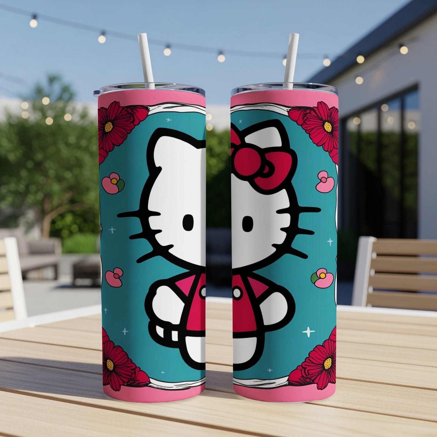 Hello Kitty tumbler with pink flowers on a teal background.