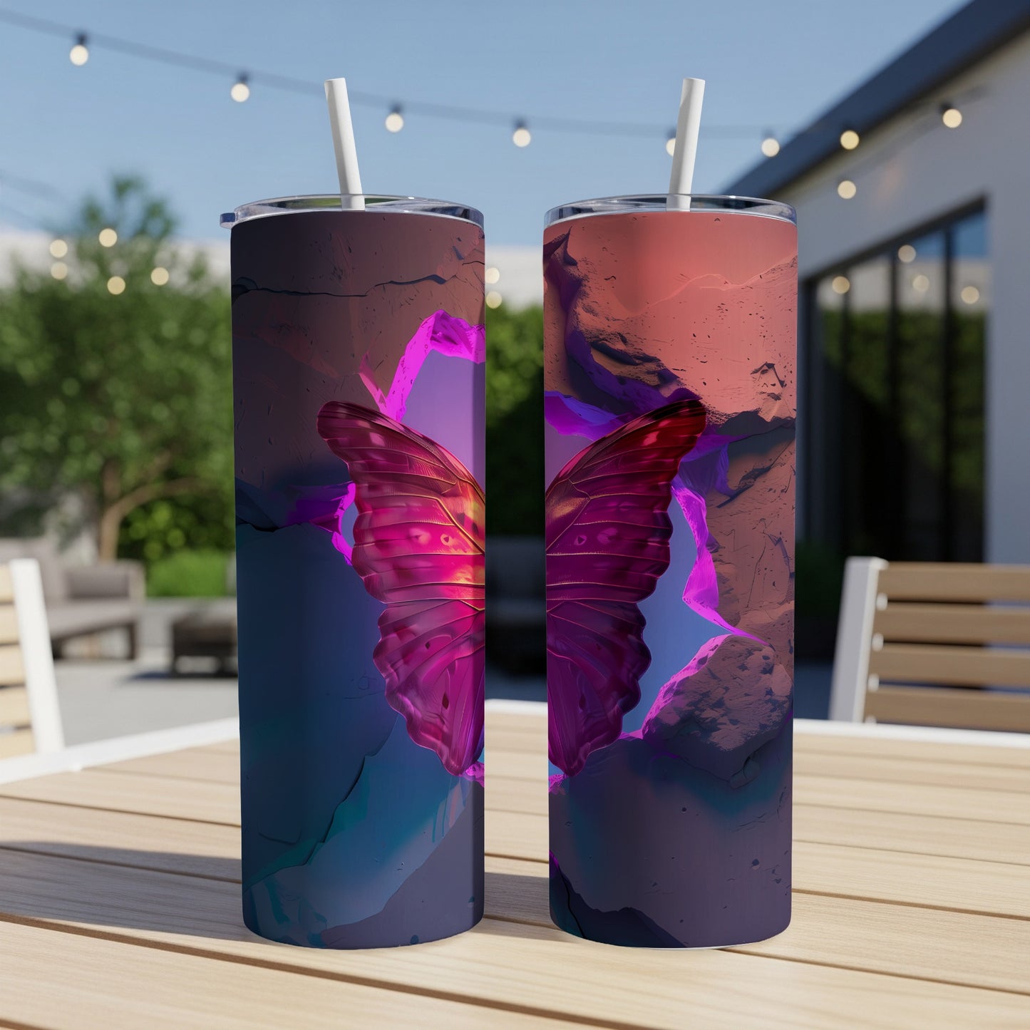 Two tumblers featuring a vibrant pink butterfly emerging from a rocky, abstract landscape.