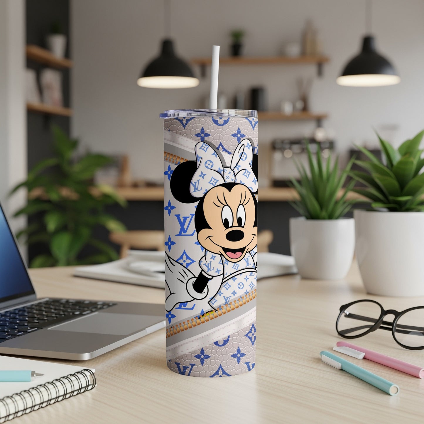 Minnie Mouse on a white tumbler with LV-inspired pattern and straw.