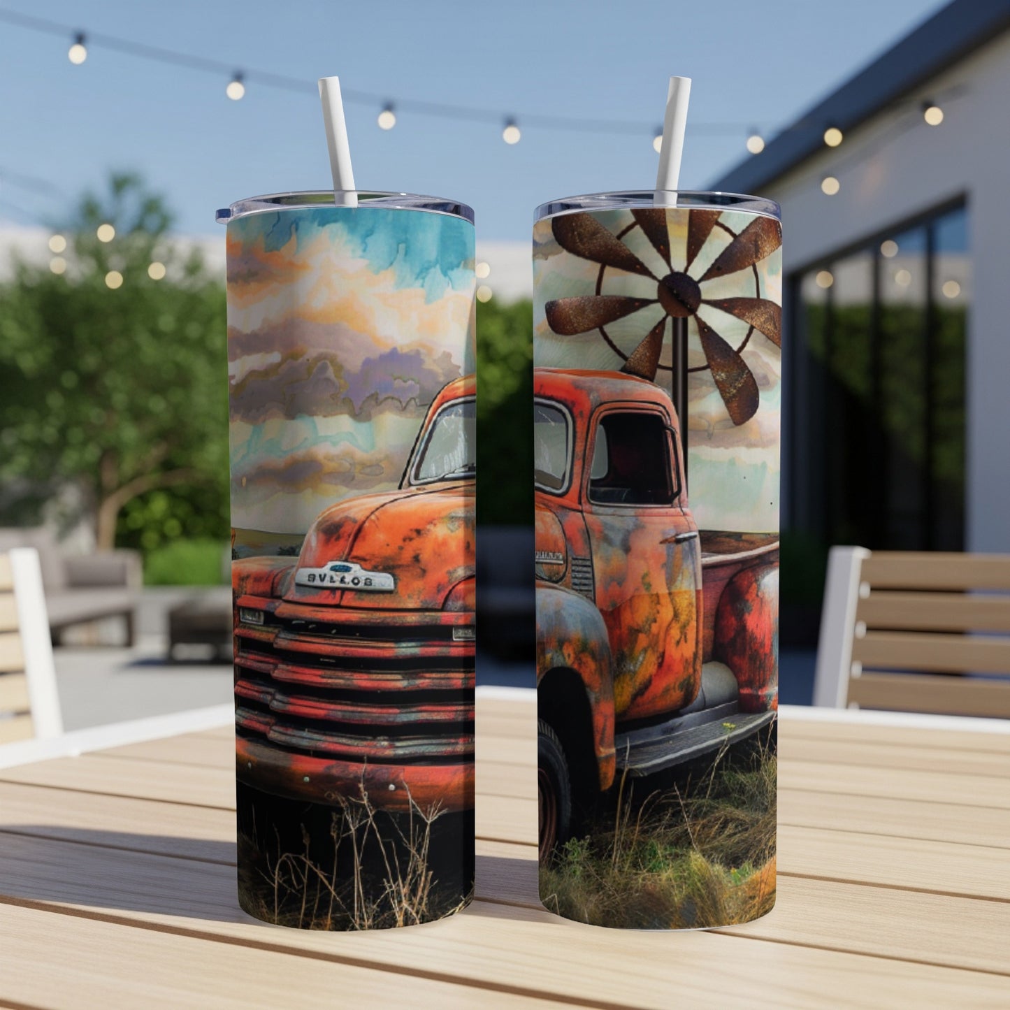 Rusty vintage truck with windmill and clouds design on a tumbler.