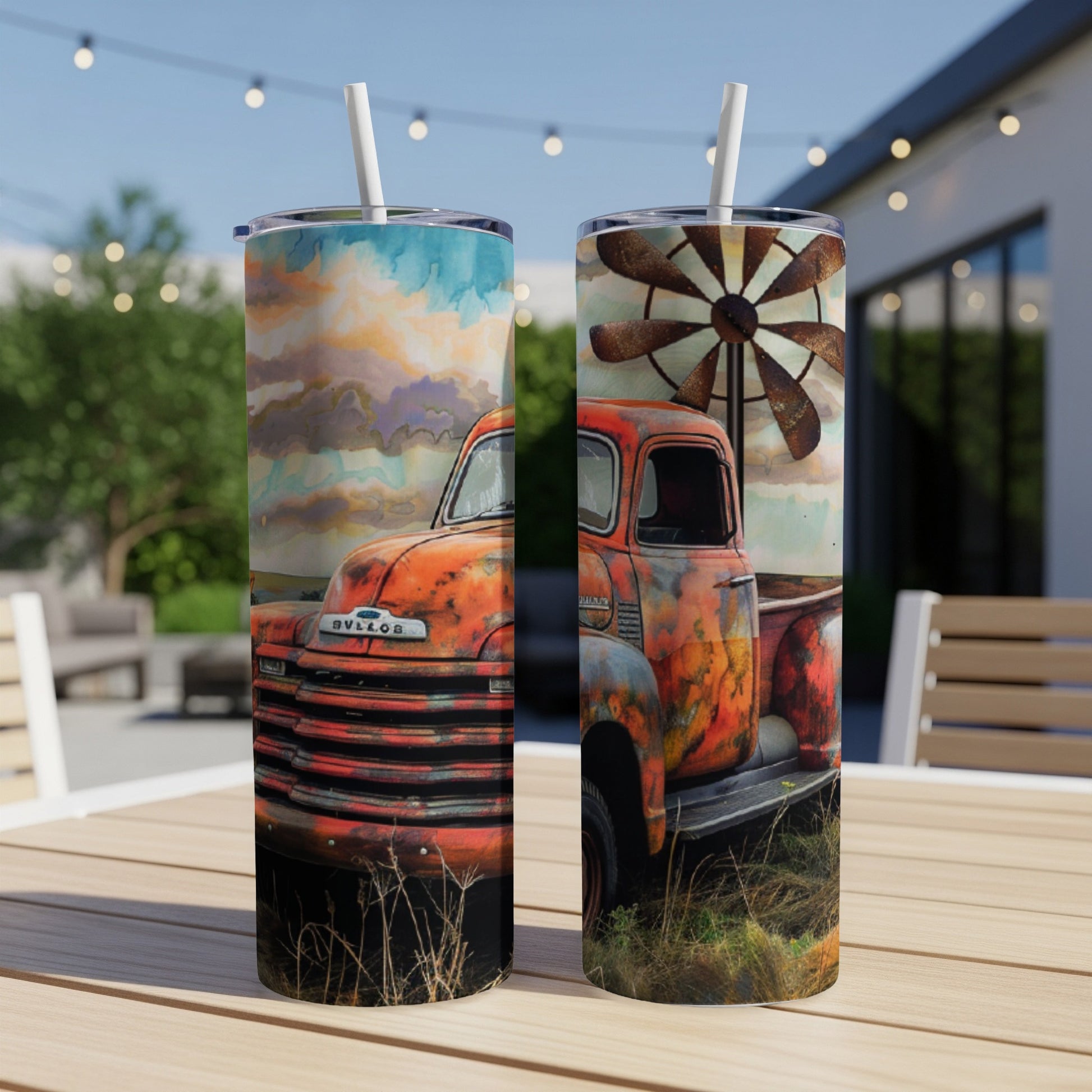 Rusty vintage truck with windmill and clouds design on a tumbler.
