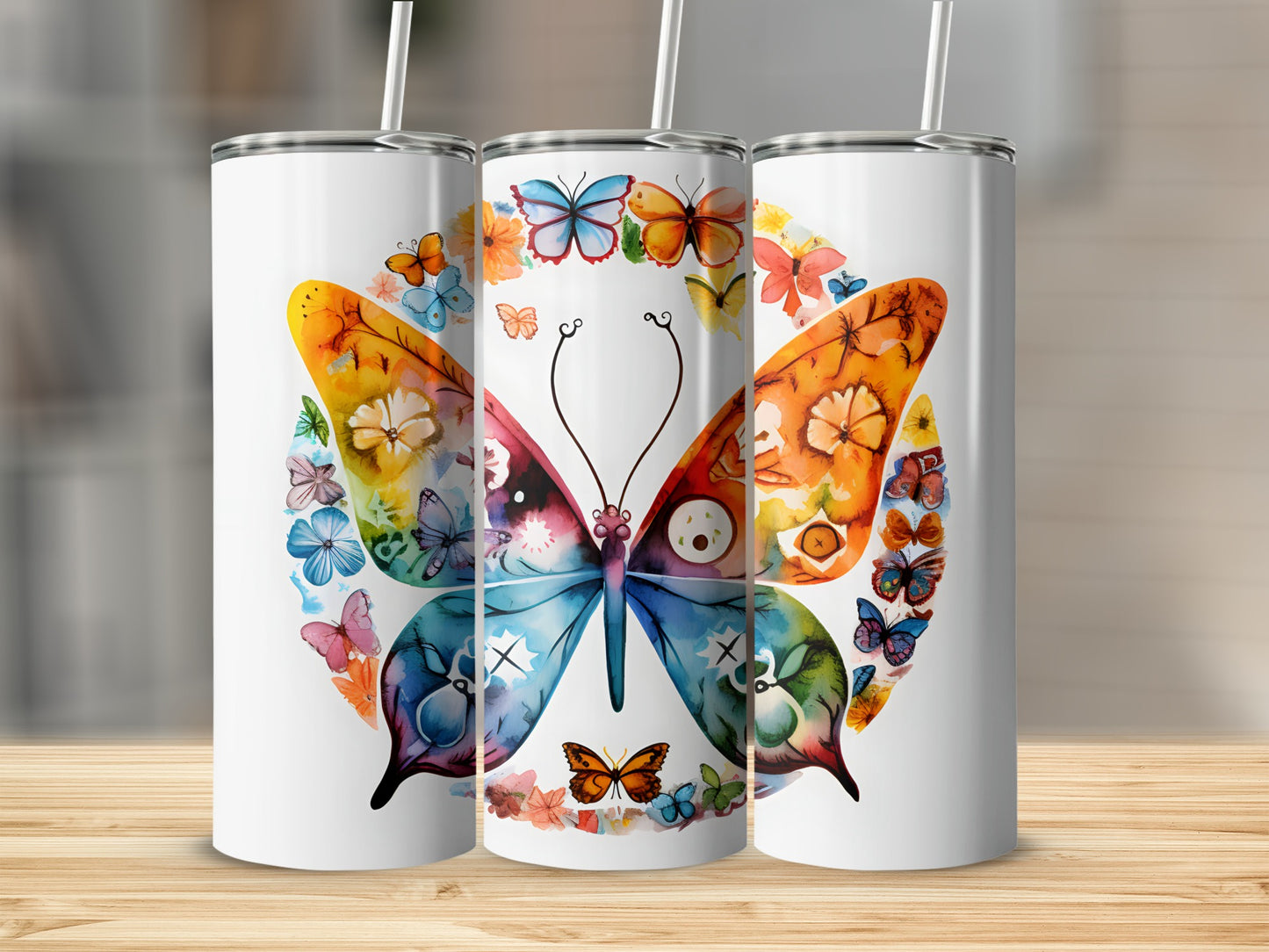 Three white tumblers featuring a colorful watercolor butterfly design.