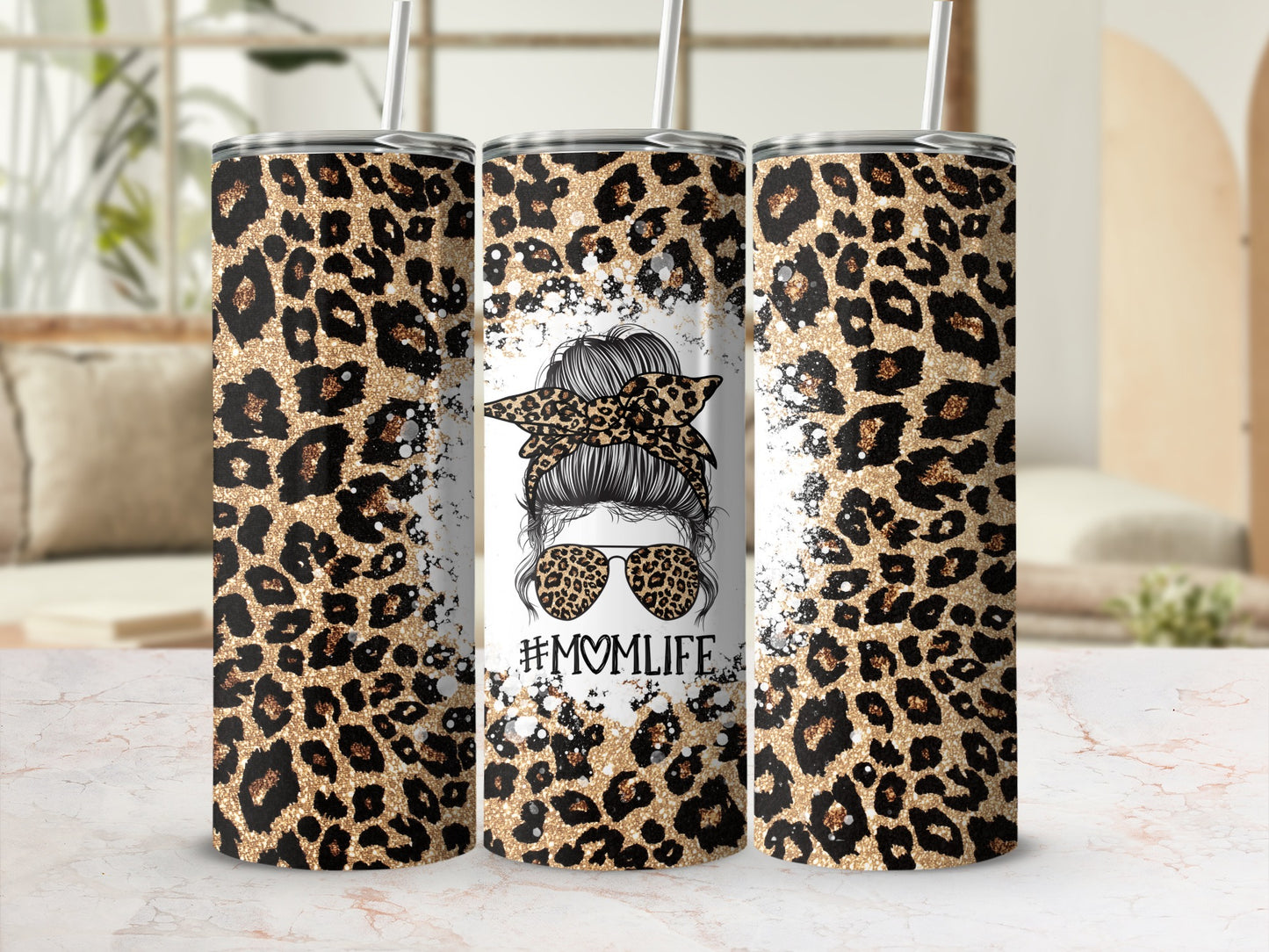 Leopard print tumbler with "Momlife" and sunglasses design.