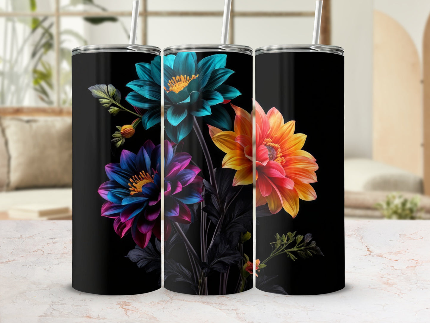 Three tumblers featuring vibrant floral designs on a black background.