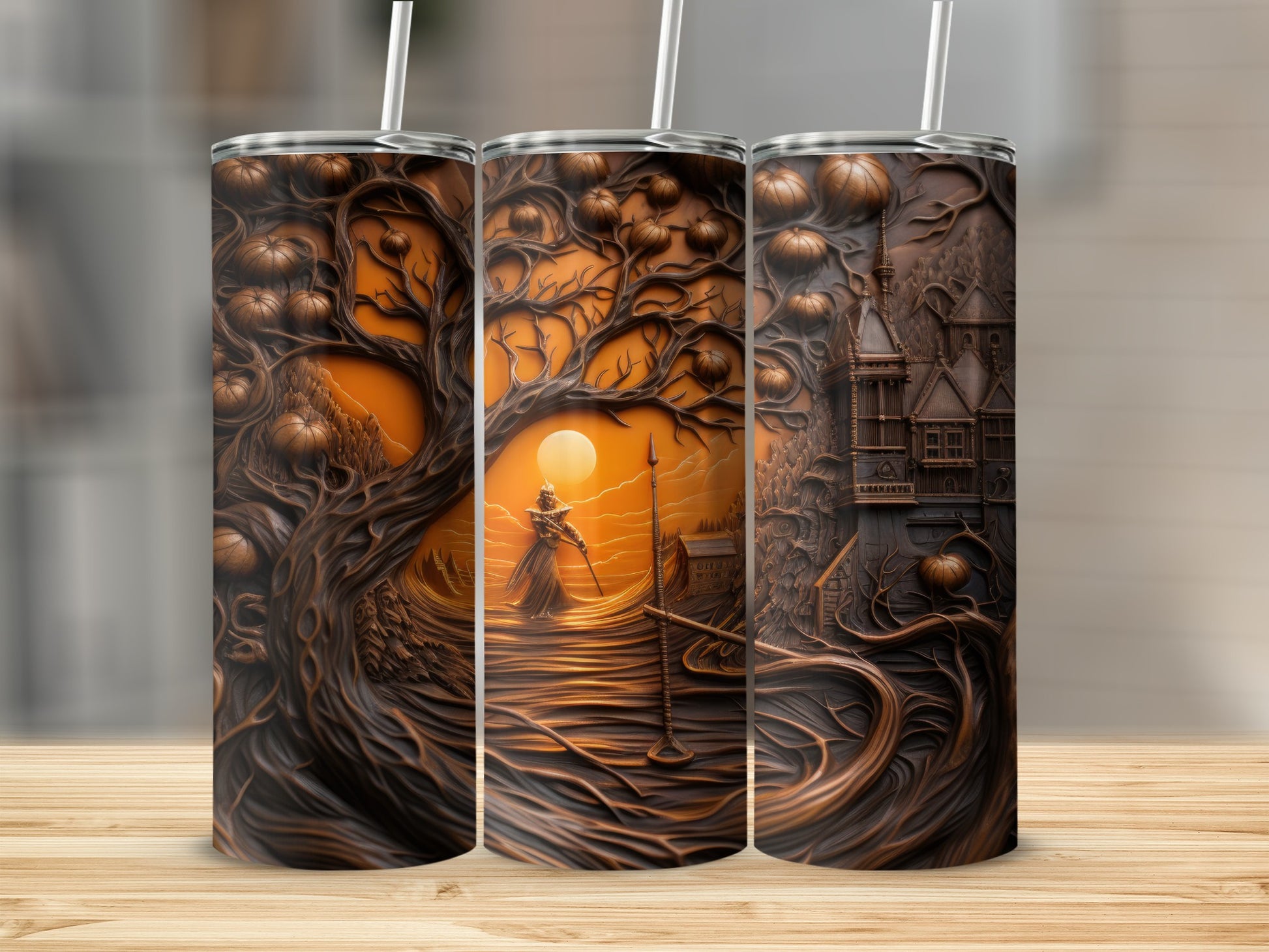 Three tumblers featuring Halloween-themed art with pumpkins, trees, and a castle.