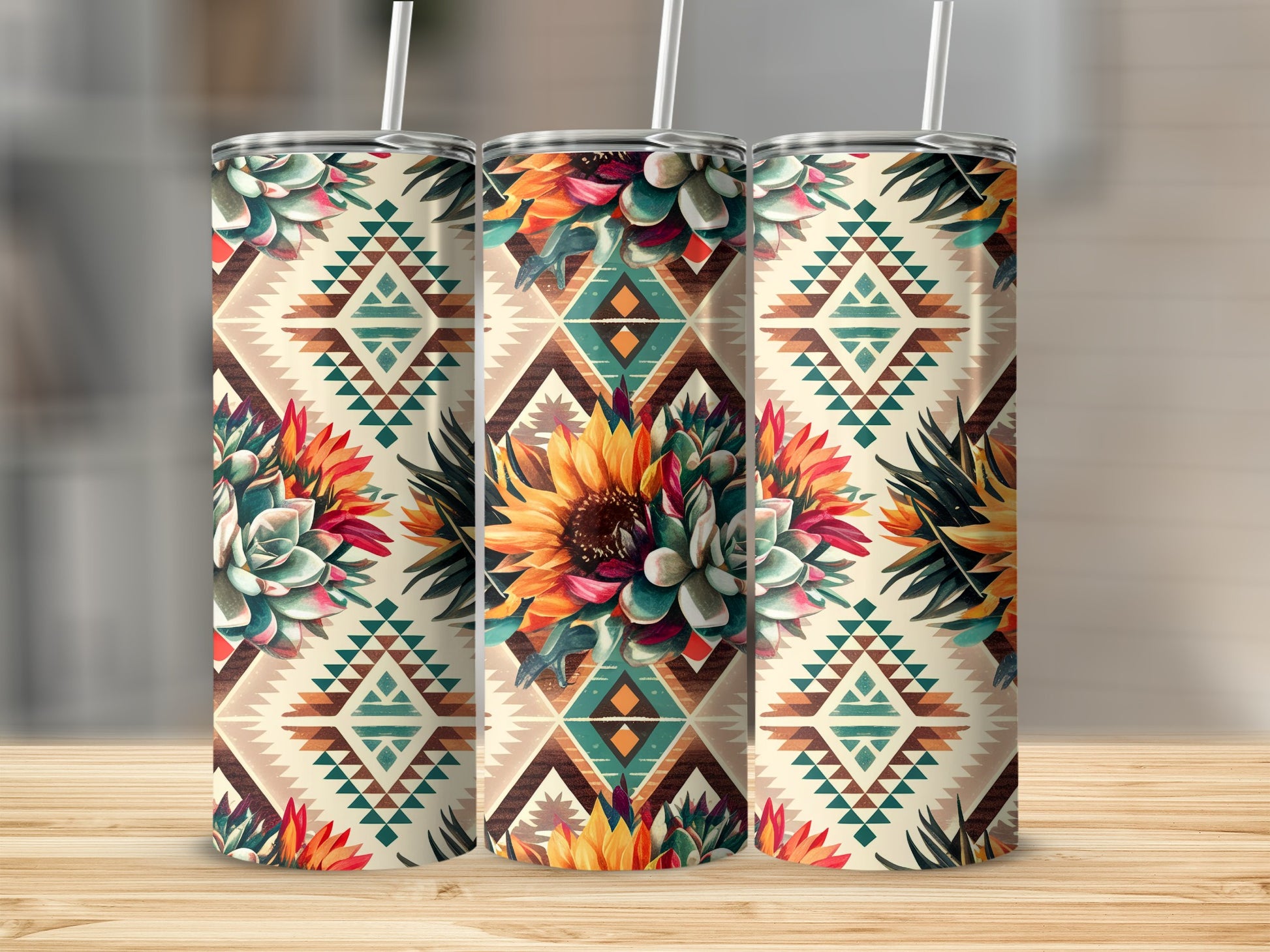 Three tumblers with a Southwestern geometric pattern and floral accents.