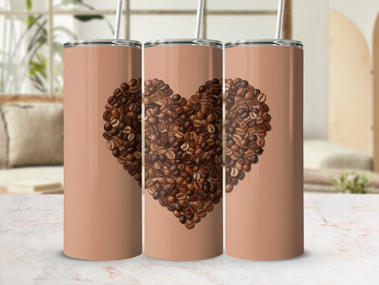 Three tan tumblers featuring a large coffee bean heart design.