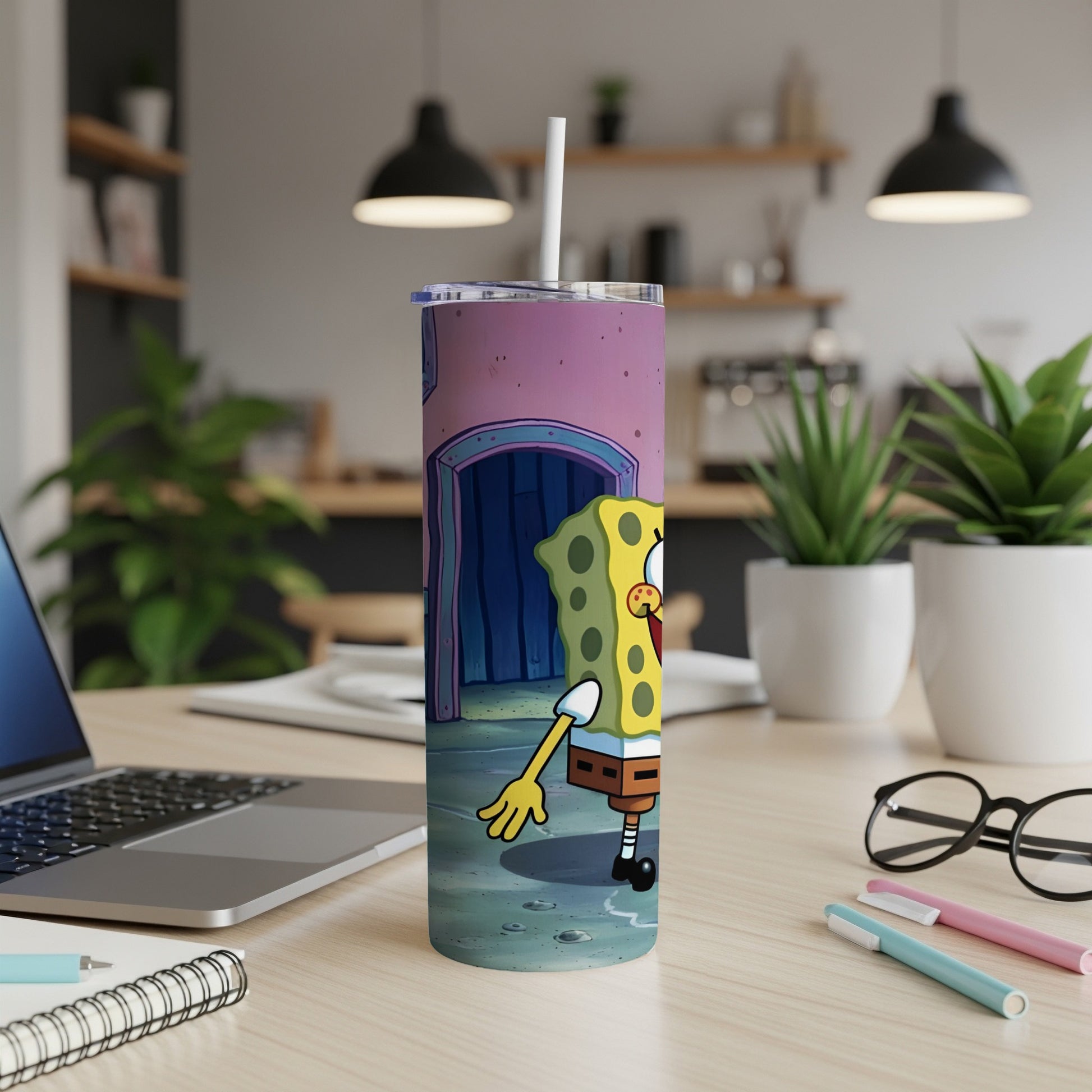 SpongeBob SquarePants character on a tumbler cup with a straw.