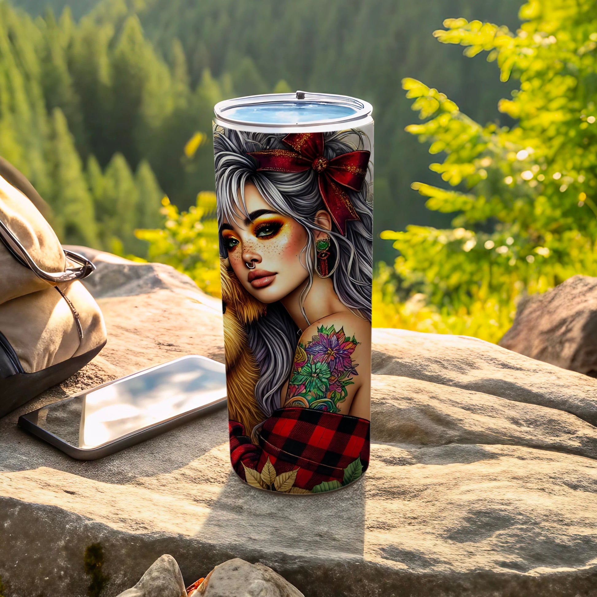 Tumbler with woman and wolf illustration, set outdoors.
