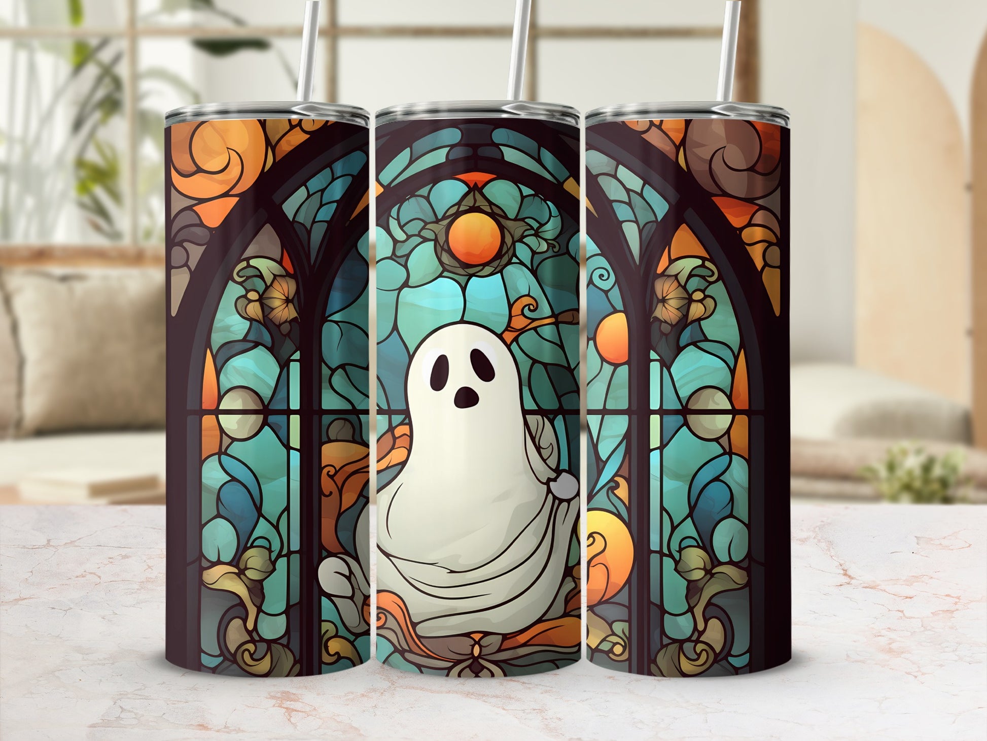 Ghost in stained glass design on three tumblers.