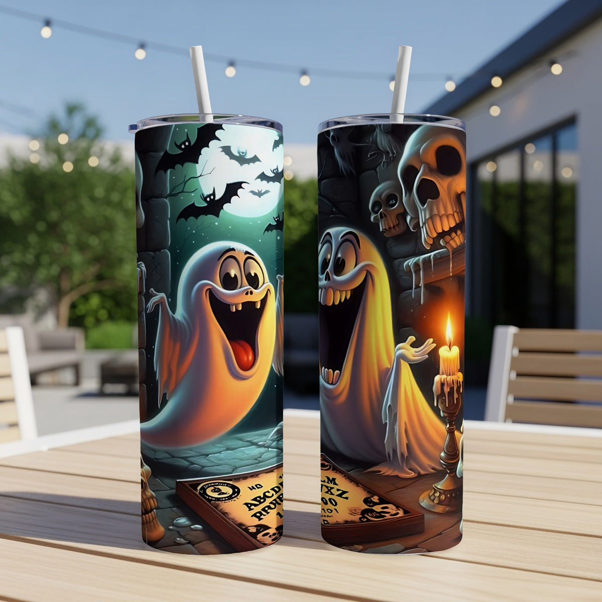 Two tumblers featuring cartoon ghosts, bats, skulls, and a Ouija board.