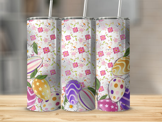 Three Easter-themed tumblers with bunnies, flowers, and decorated eggs.
