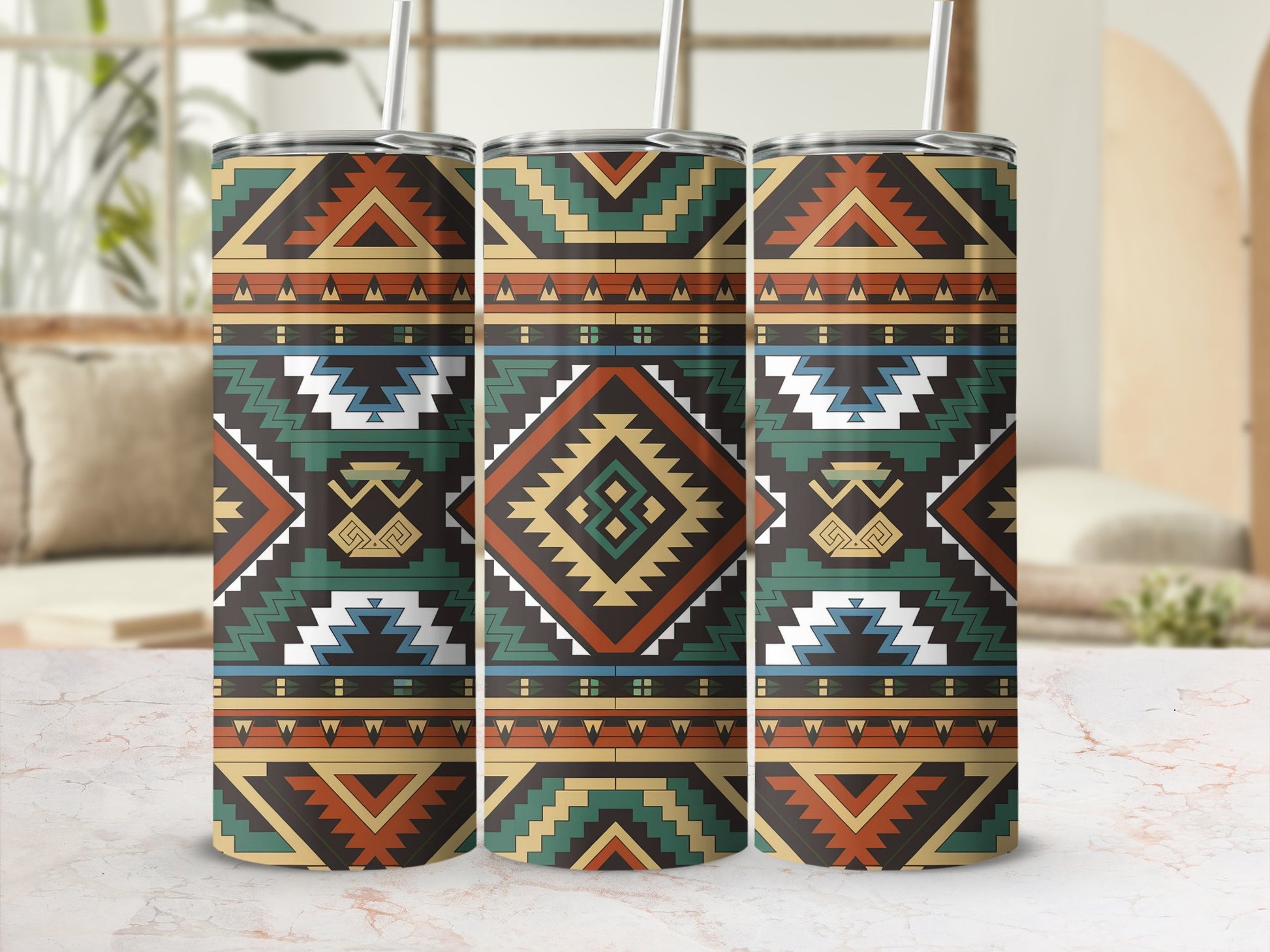 Three patterned tumblers with geometric tribal designs in brown, teal, and white.