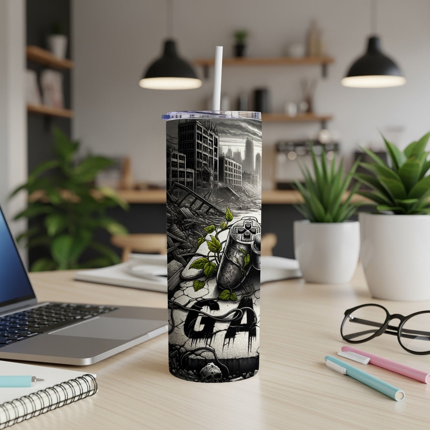 Graffiti-style tumbler with gaming controller and dystopian cityscape design.