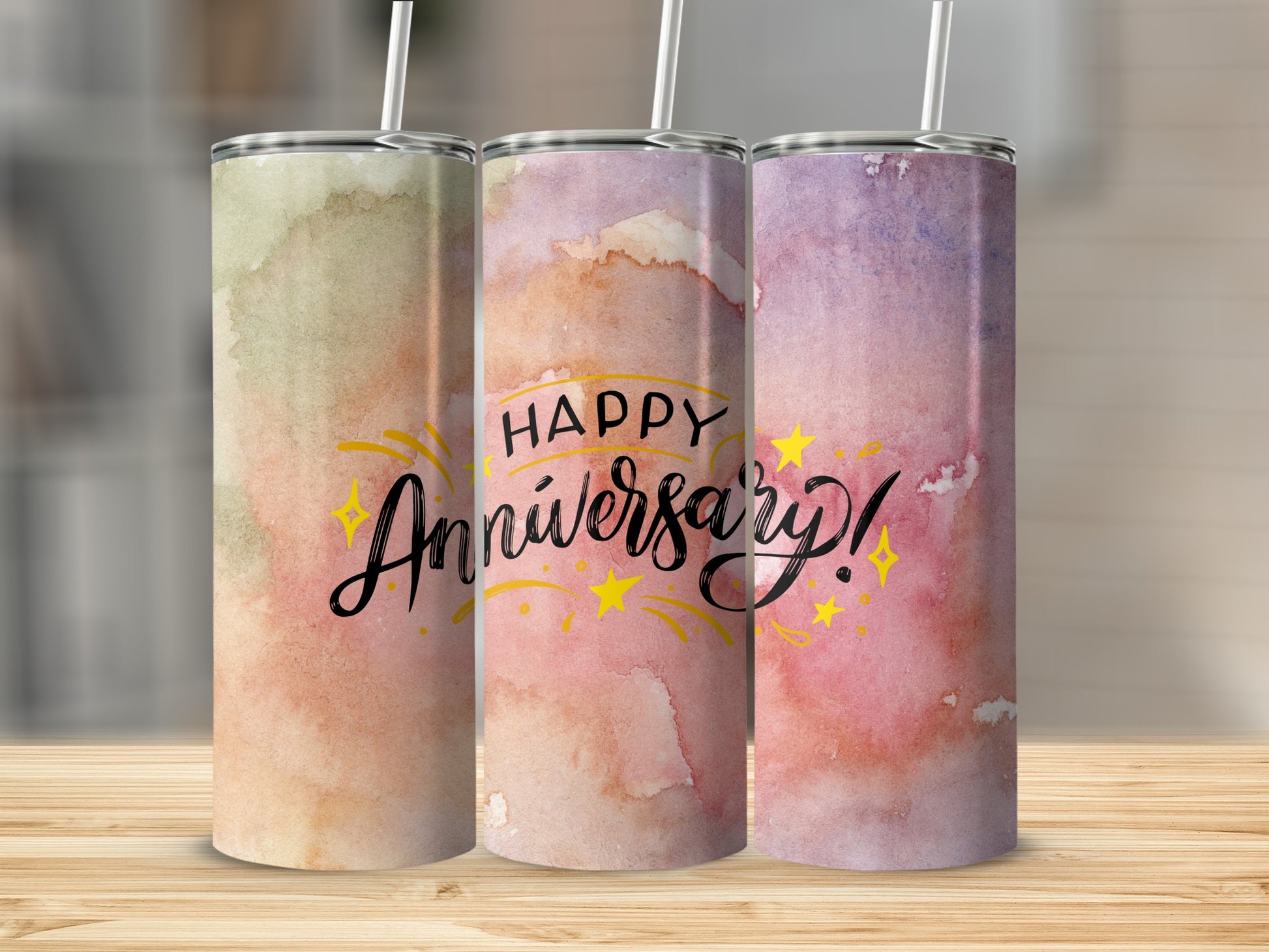 Three tumblers with watercolor designs and "Happy Anniversary!" text.