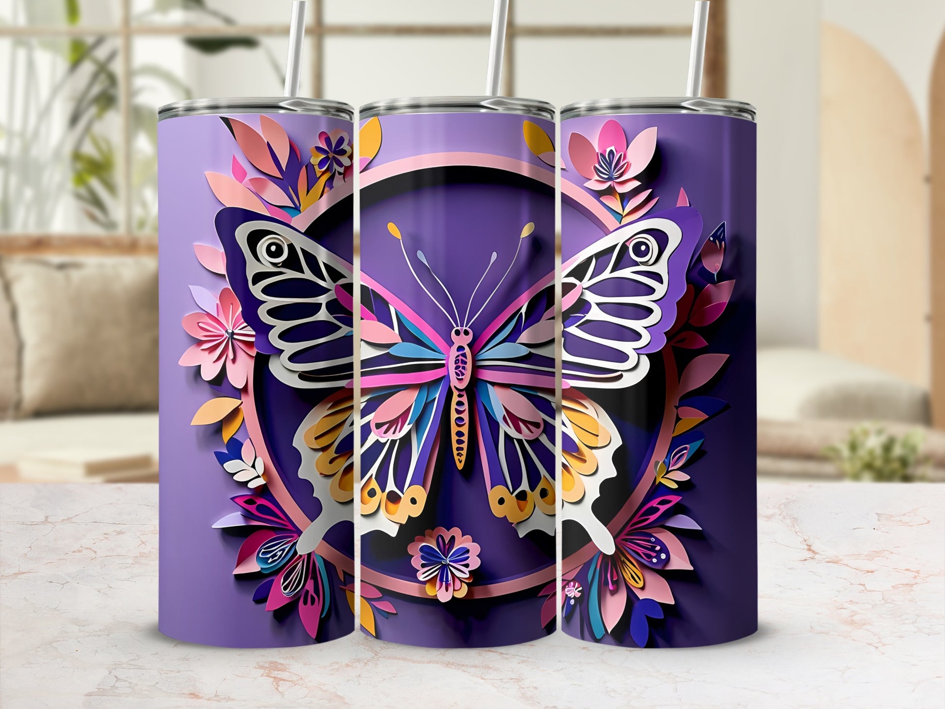 Three tumblers with colorful butterfly and floral paper cut-out designs.