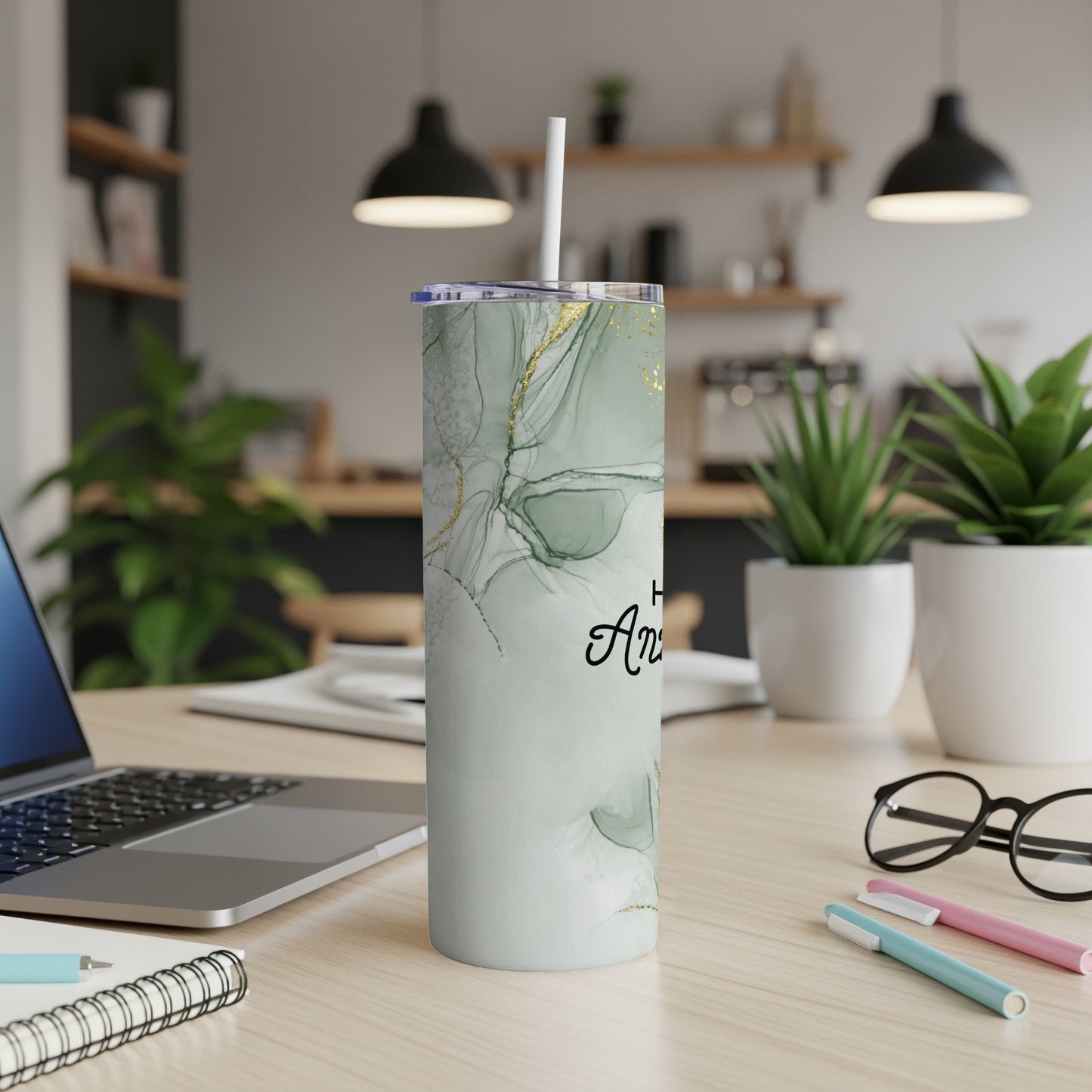 Tall tumbler with marble pattern and gold accents, with "Happy Anniversary" text.