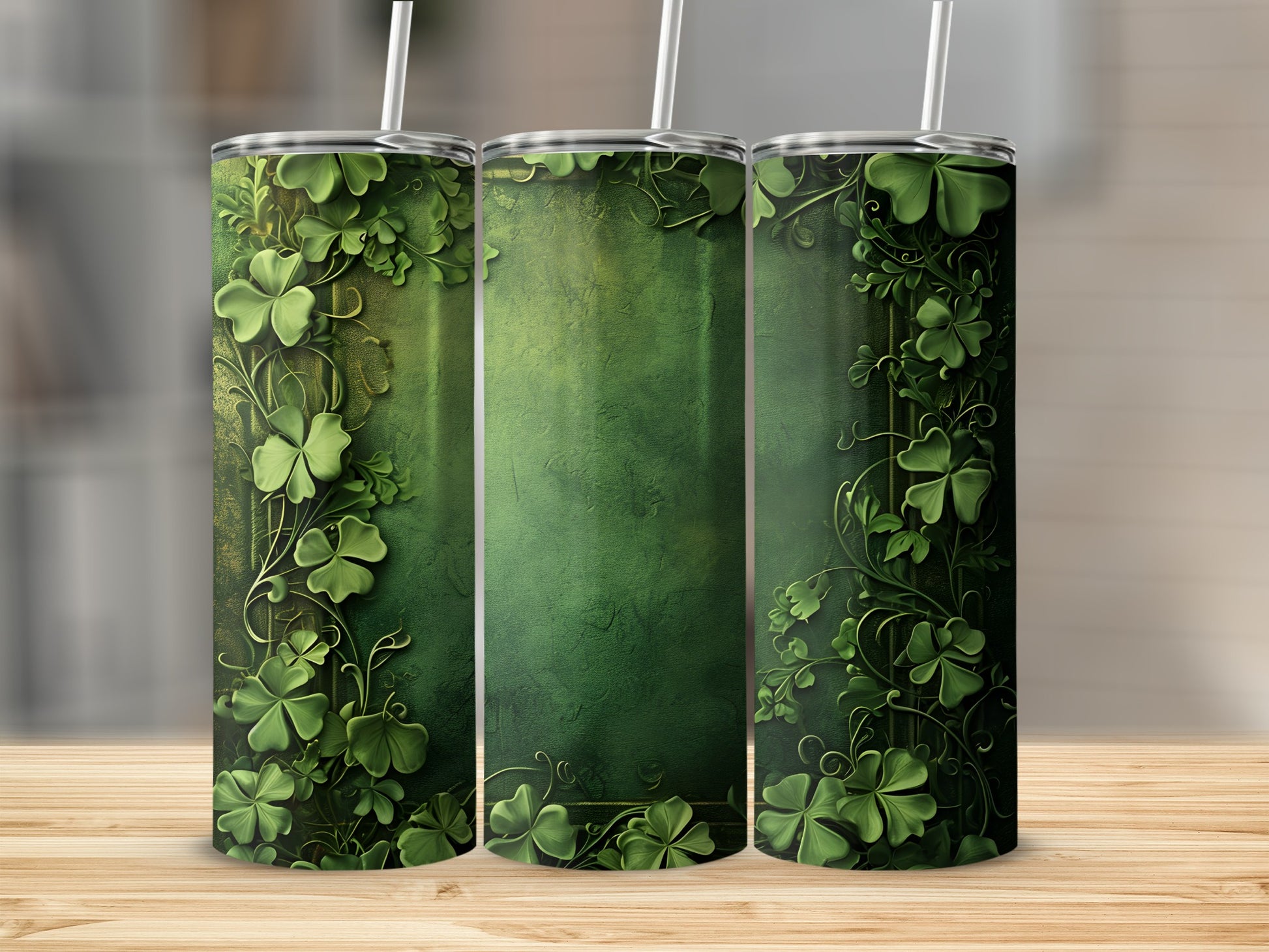 Green tumbler with shamrocks and vines on a wooden surface.