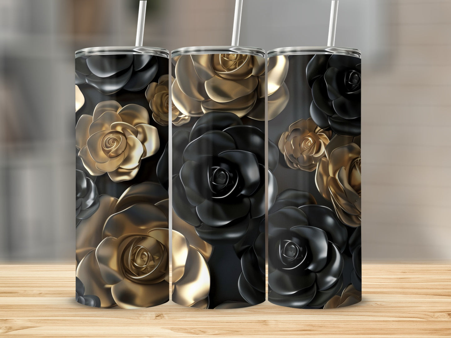 Three tumblers with black and gold rose floral patterns.