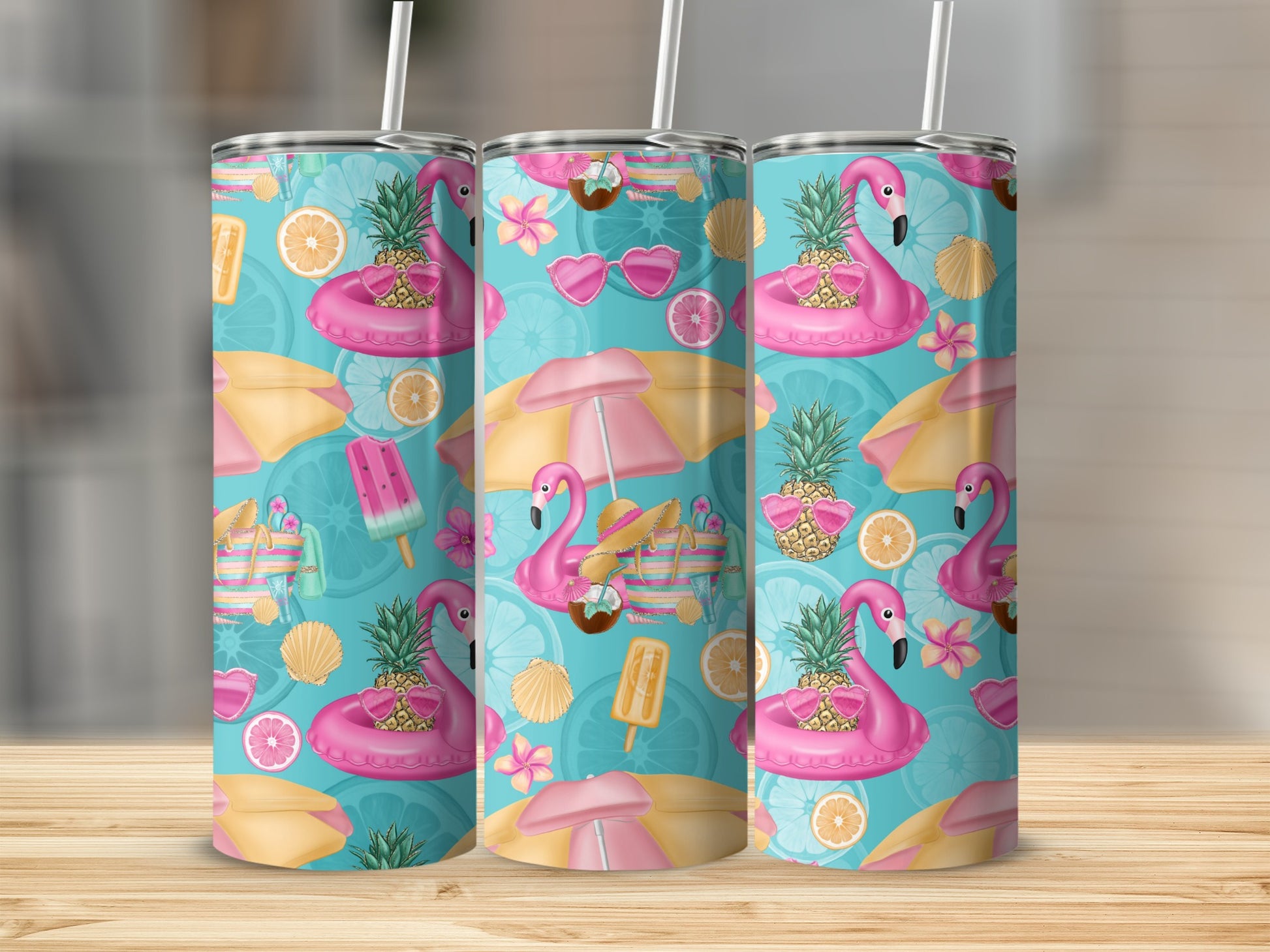 Three tumblers with a tropical flamingo and pineapple summer pattern.