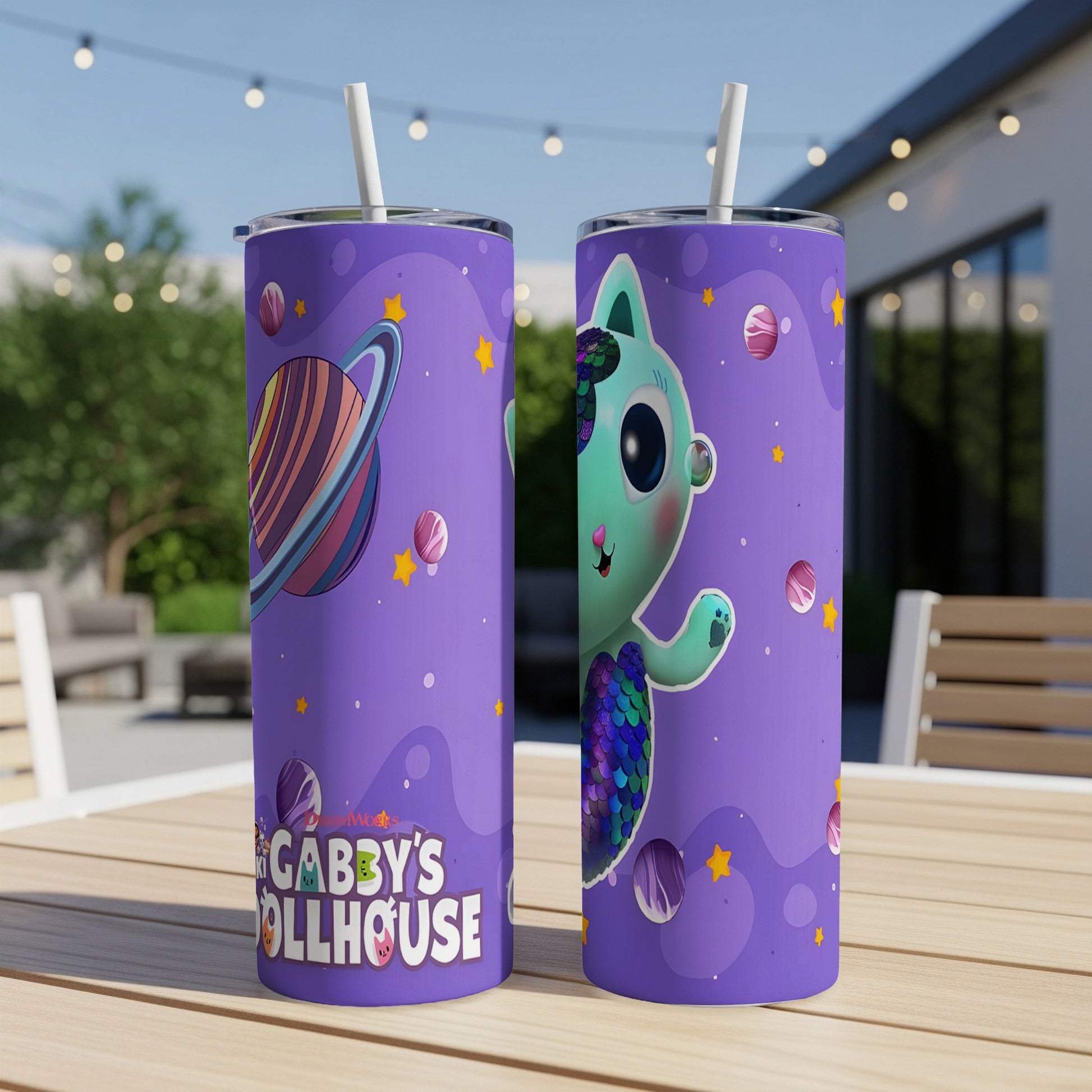 Gabby's Dollhouse tumbler with colorful cartoon cat and planets.