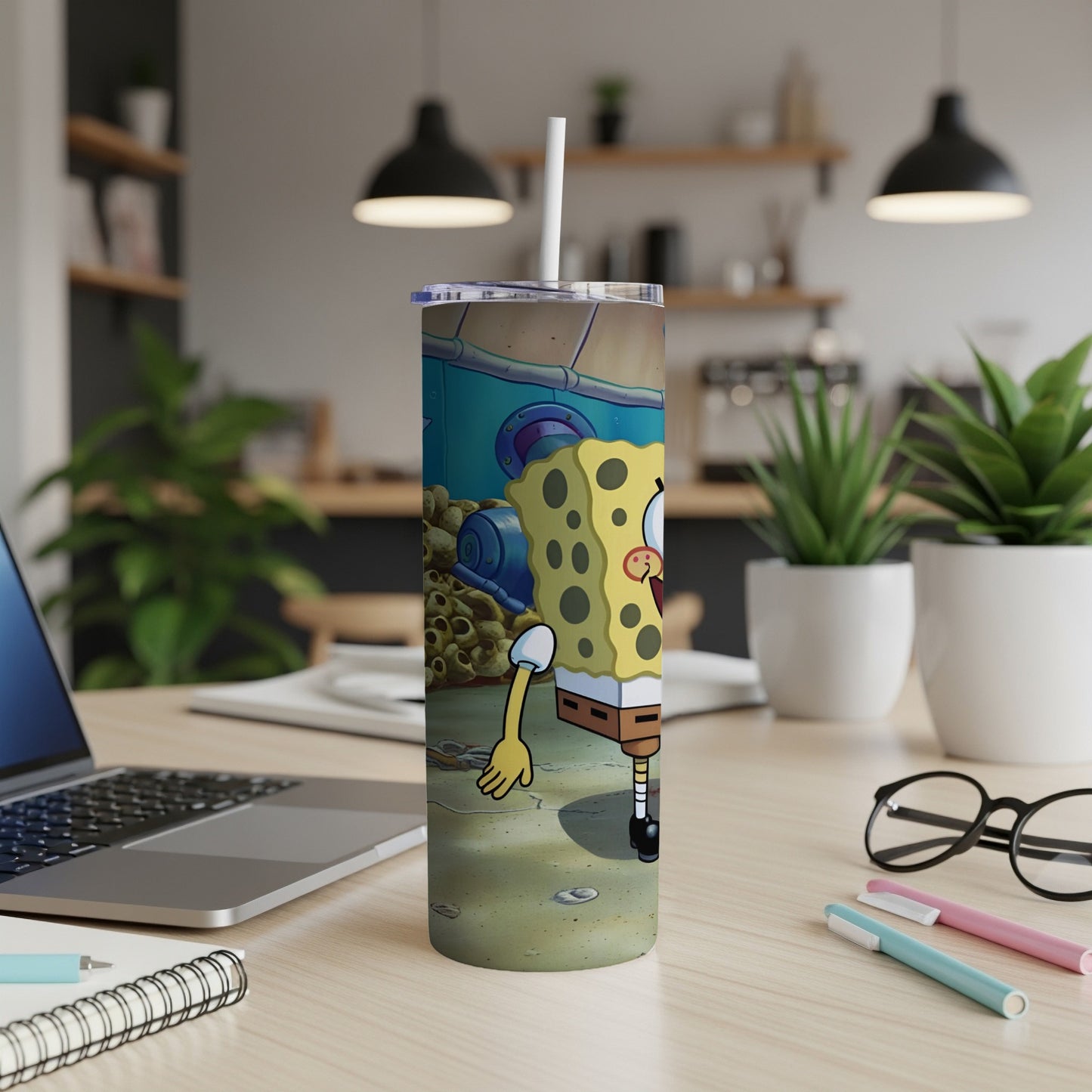 SpongeBob SquarePants character on a skinny tumbler with a straw.