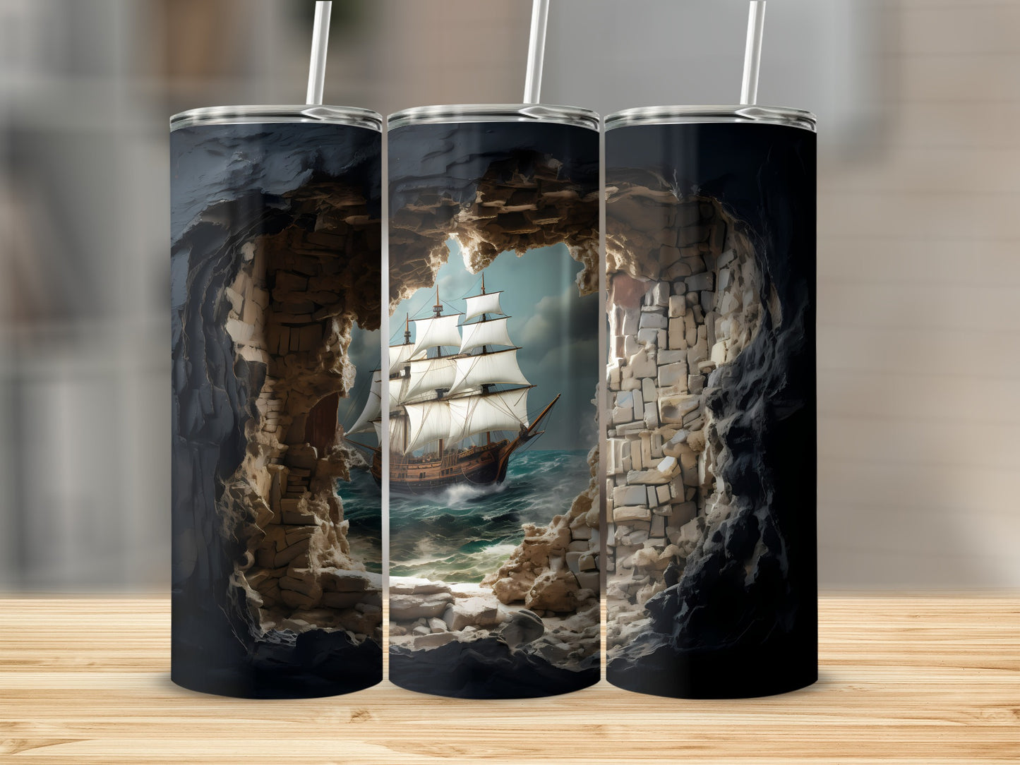Tall tumbler with a sailing ship in a rocky cave entrance.
