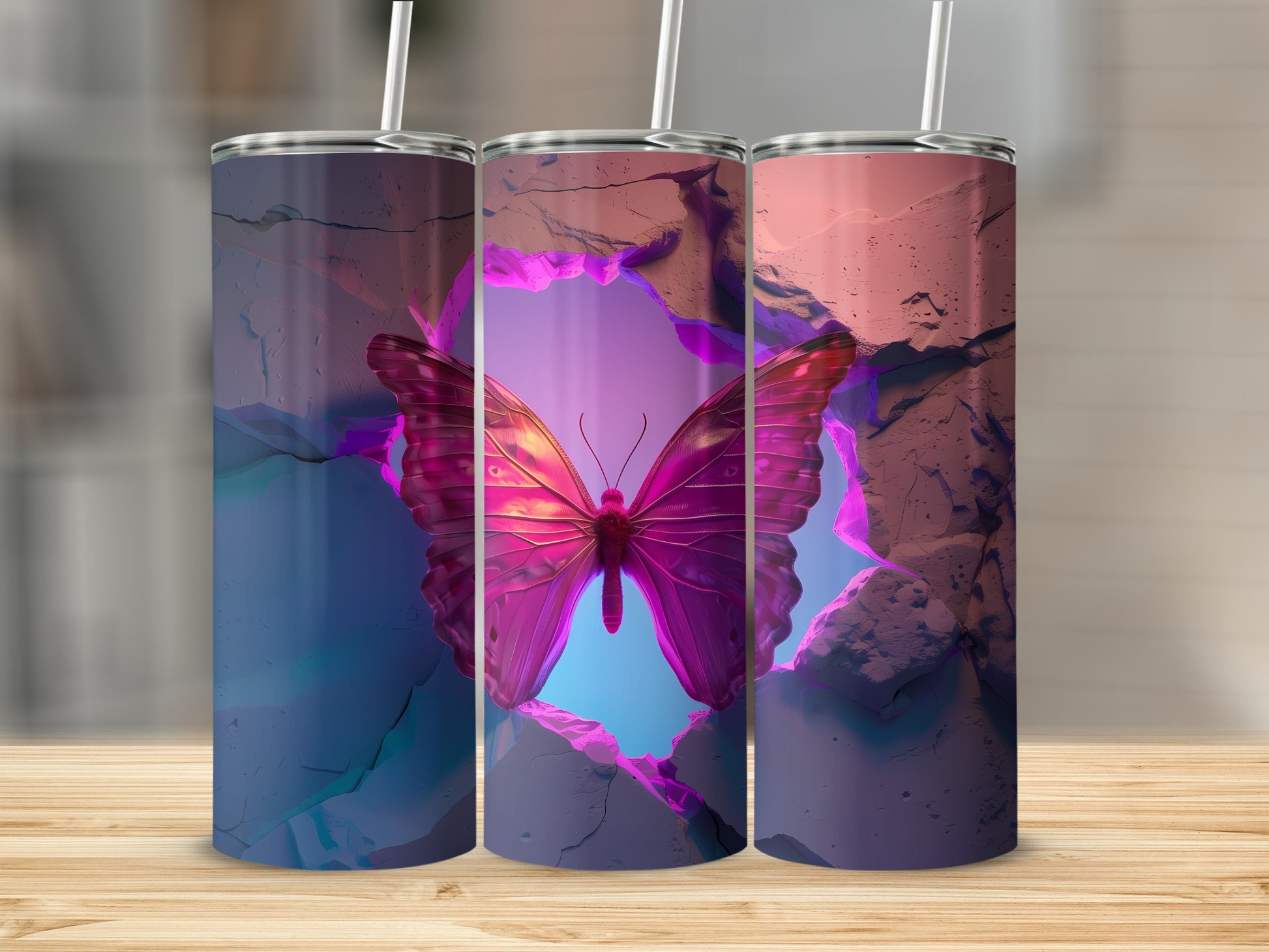 Three tumblers featuring a large purple butterfly emerging from cracked rock.