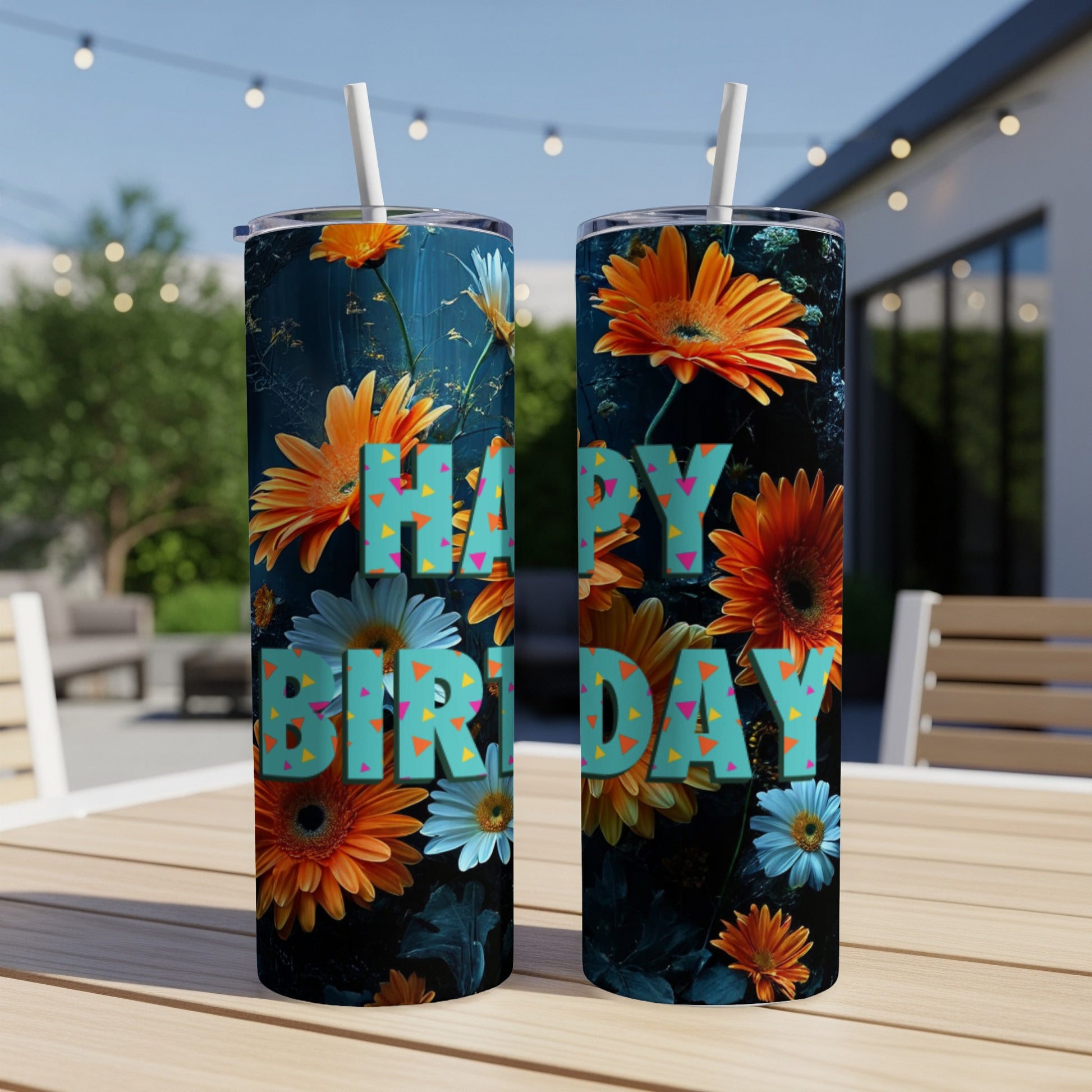 Two tumblers with "Happy Birthday" text surrounded by colorful flowers.