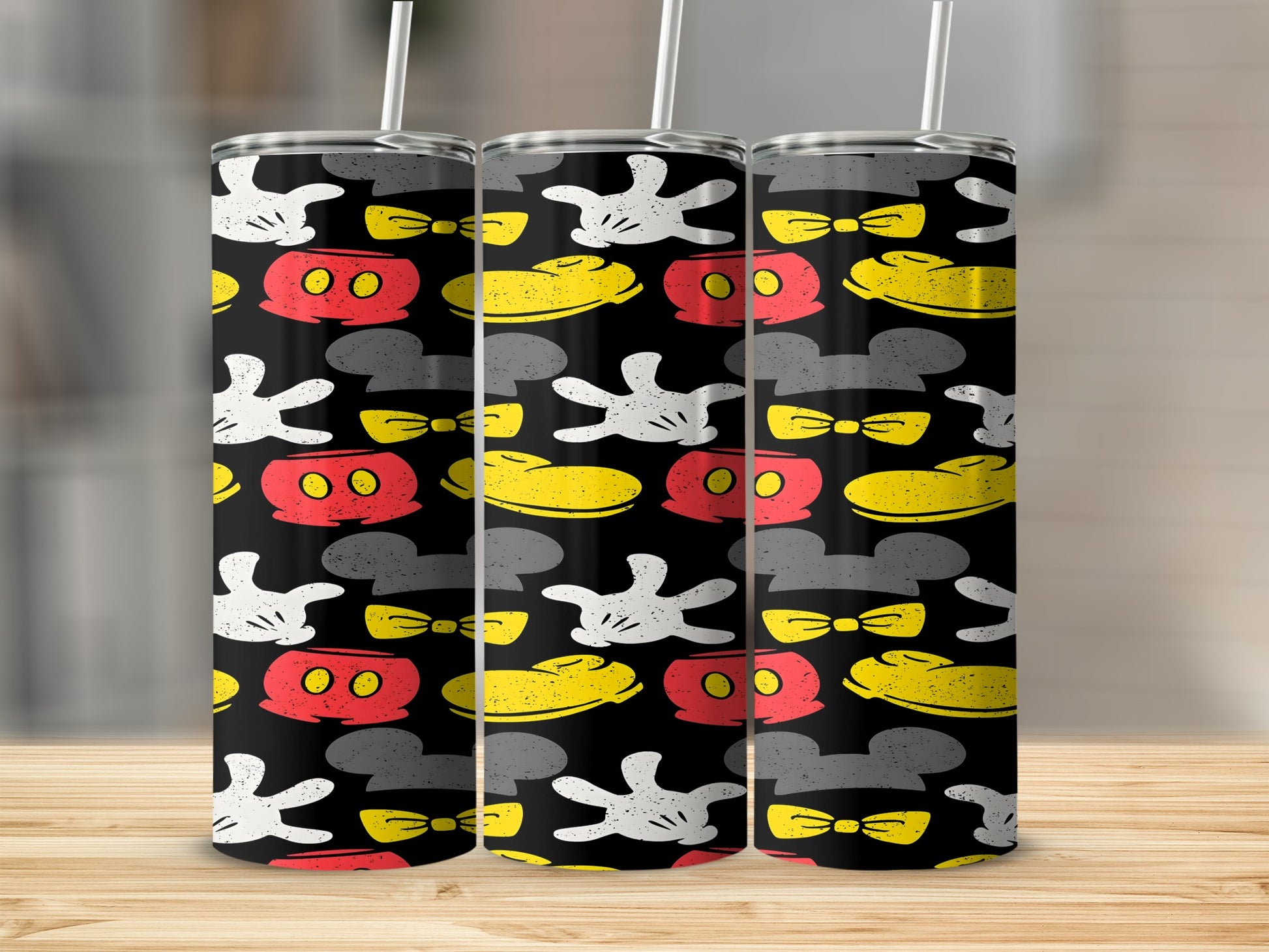 Three tumblers with Mickey Mouse ears, gloves, and bow tie pattern.