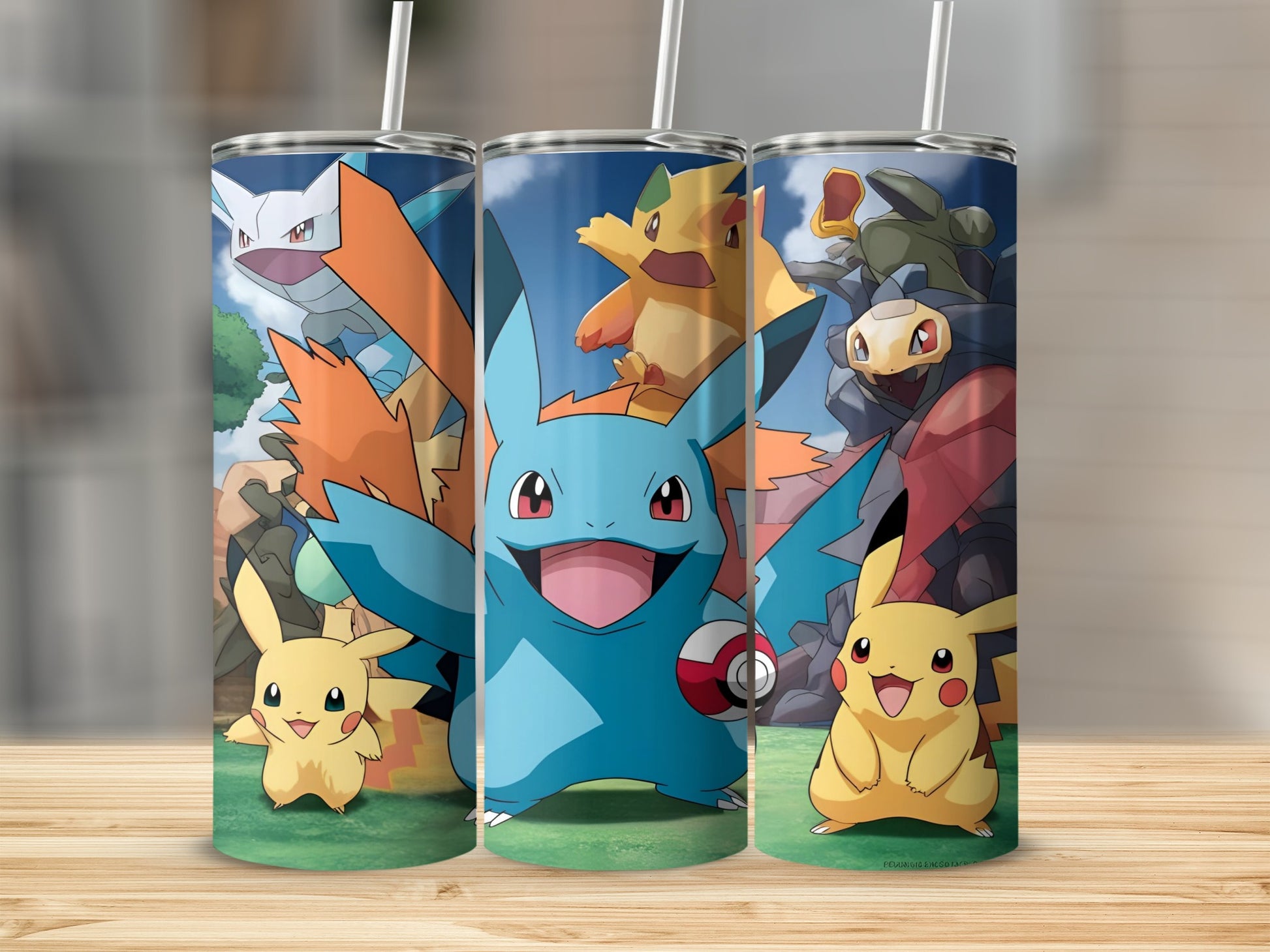 Three Pokémon tumblers featuring Pikachu, Mudkip, and other Pokémon characters.