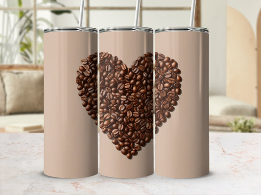 Three tan tumblers with a coffee bean heart design.