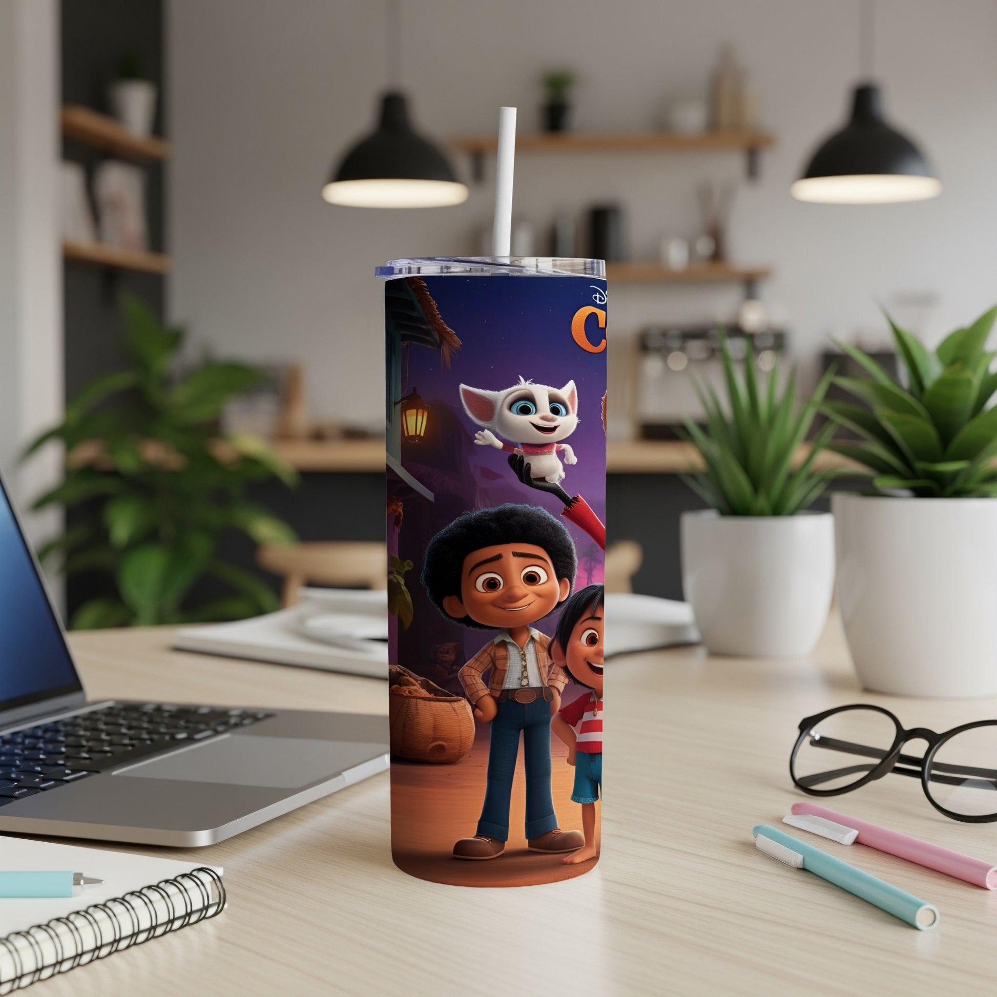 Cartoon characters on a purple tumbler with straw, set on a desk.